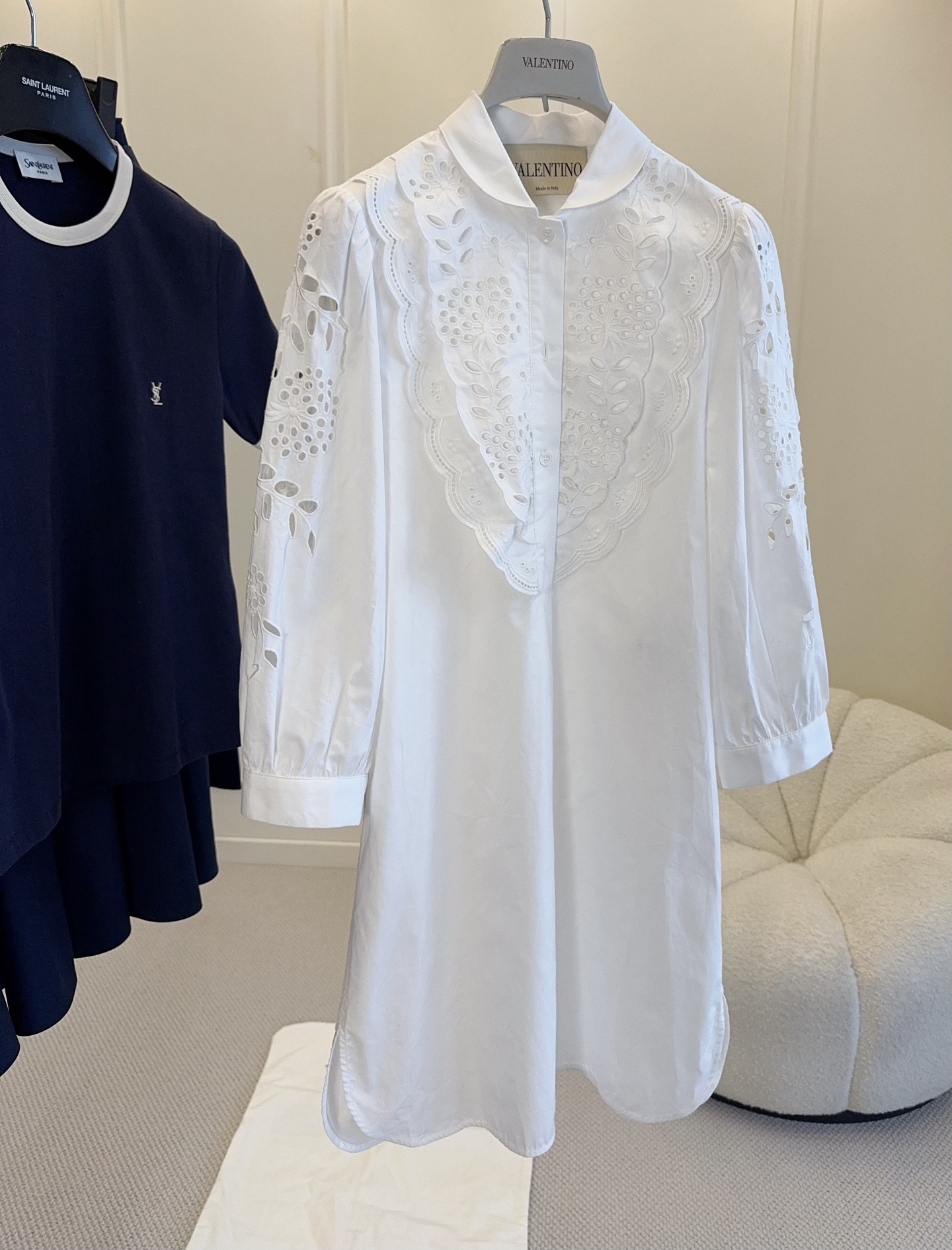 NO:802405,Valentino's 2026 new white hollow shirt skirt is made of high-quality cotton fabric, soft and skin-friendly, and super comfortable to wear in spring and summer!  Exquisite hollow crochet + ruffles, full of French romantic atmosphere. Loose style, elegant and practical, can be easily used for commuting, vacation, and daily life. The white color is versatile, it looks great with high heels or casual shoes, and it is easy to switch between multiple styles!  ,,valentino,high heels,skirts,shirts,19860909Valentino2026新款白色镂空衬衫裙,采用高品质棉质面料,柔软亲肤,春夏穿超舒服！精致镂空钩花+荷叶边,法式浪漫氛围感拉满.宽松版型,优雅又实用,通勤、度假、日常都能轻松驾驭.白色百搭,随便配高跟鞋or休闲鞋都很出彩,轻松切换多种风格！,,valentino,high heels,skirts,shirts,,Women's clothing