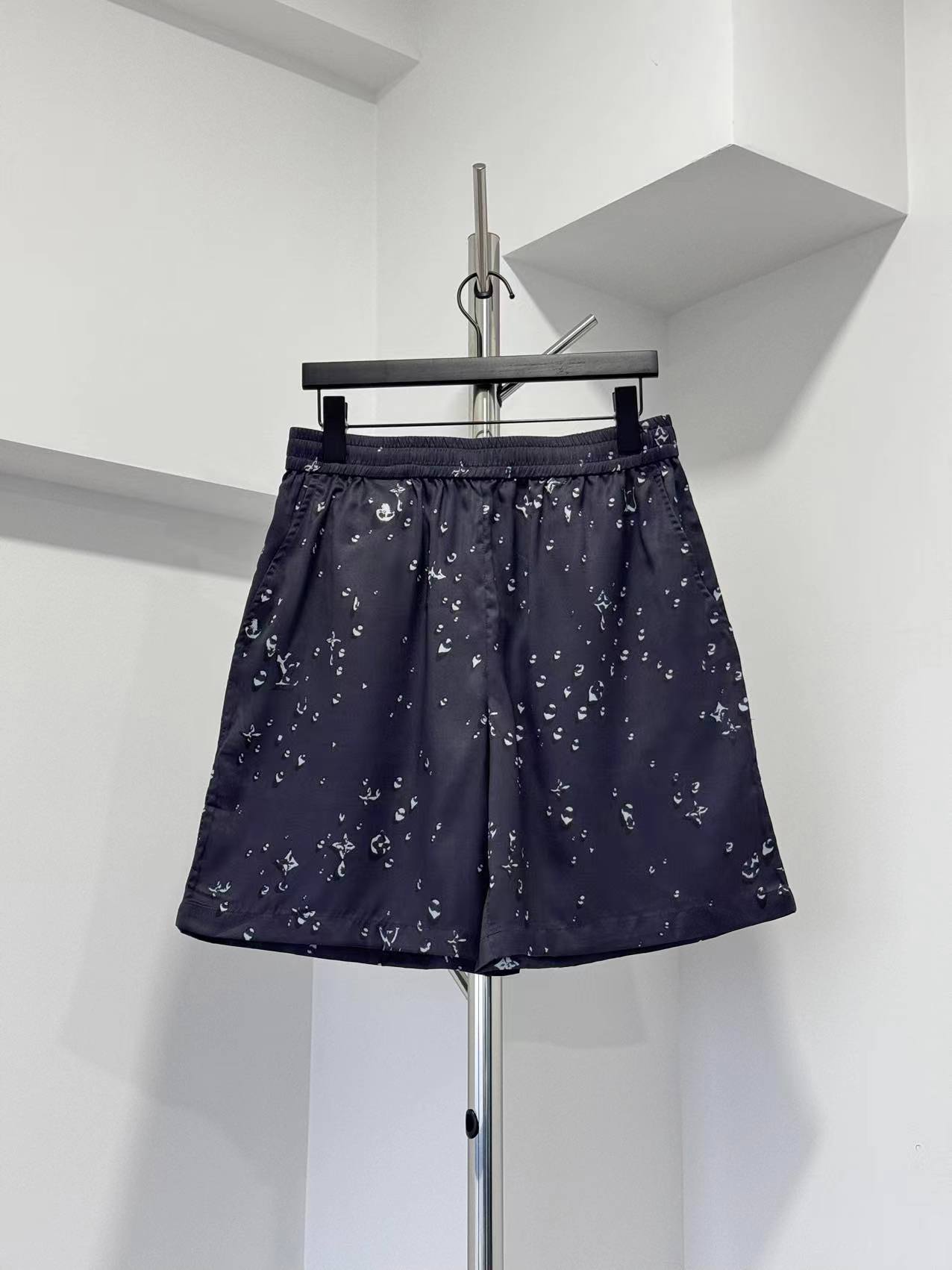 P180 LV shorts con estampado de gotas de lluvia