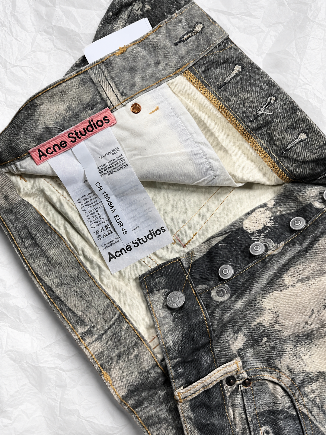 Acne Studios ACNE 油渍泼墨印花牛仔裤