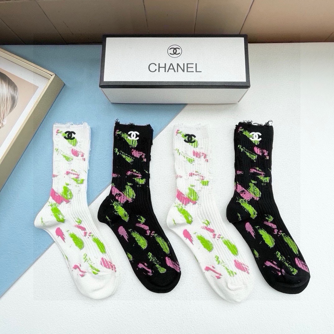 Almacenar
 Chanel Calcetines de tubo Algodón