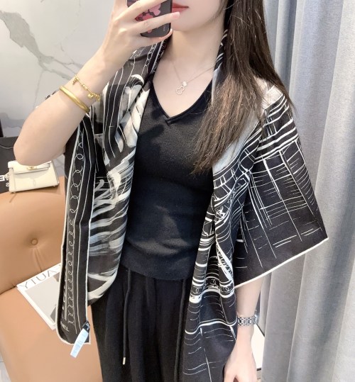 Elegant Chanel Black and White Silk Scarf with Camellia and Coco Accents 1 Elegant Chanel Black and White Silk Scarf with Camellia and Coco Accents