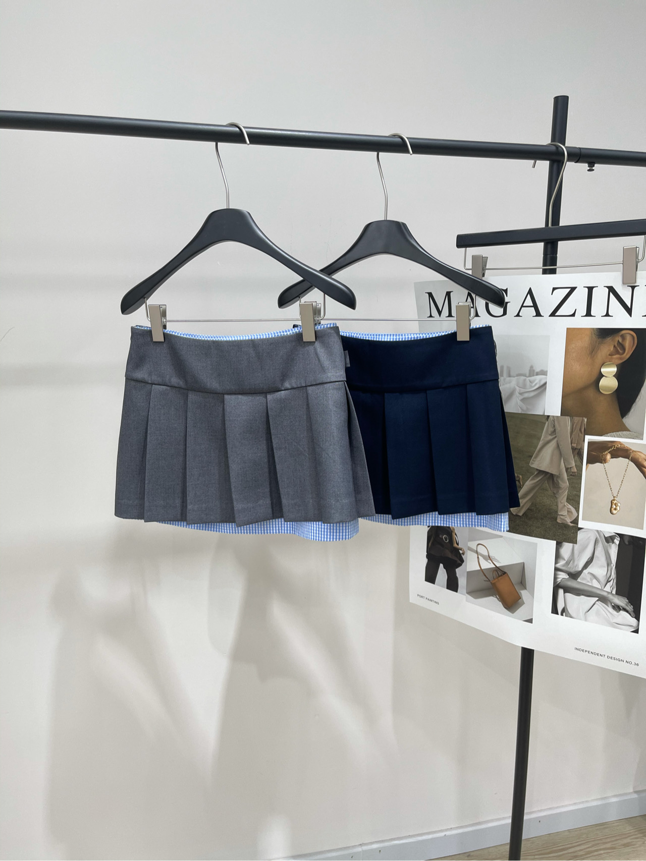 【her蝴蝶结开衩百褶短裙】🔺，面料：聚酯纤维+羊毛颜色：灰色、藏蓝25AW假两件格纹拼接不对称设计百褶