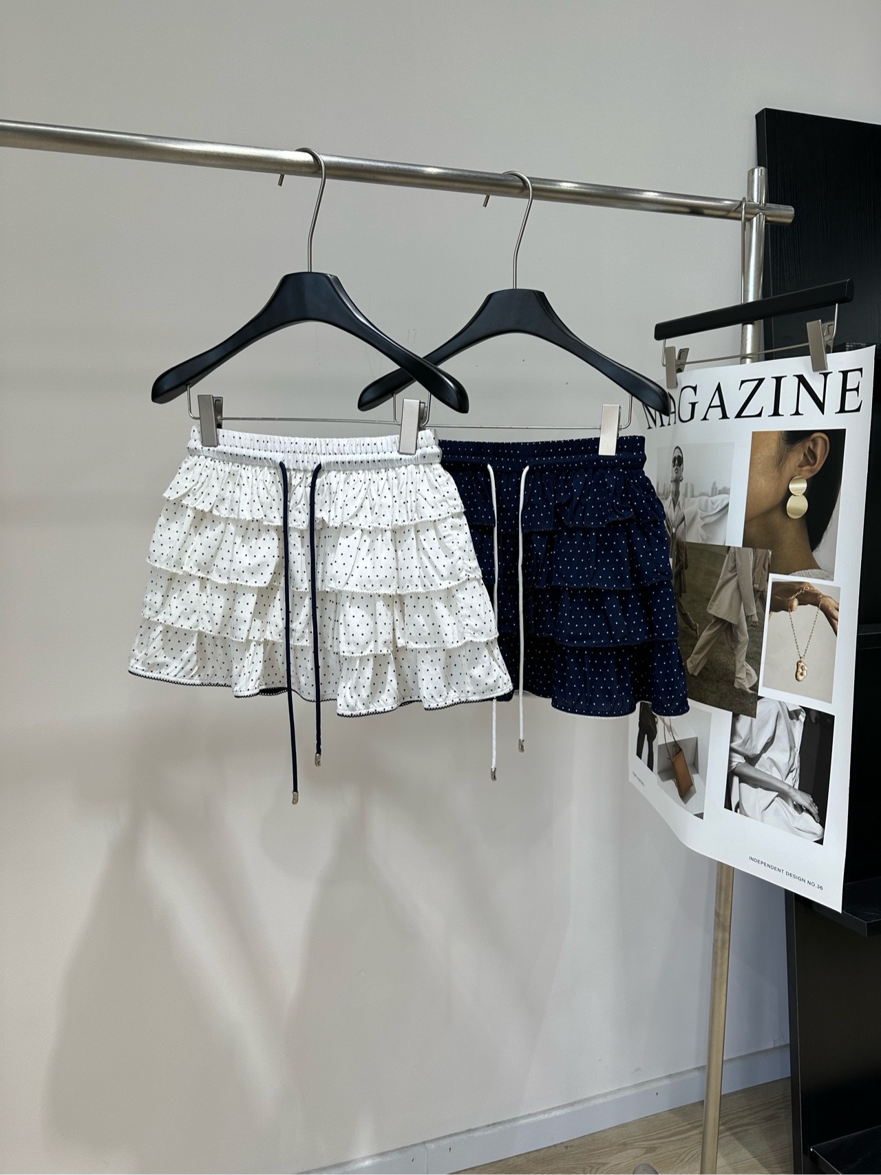 NO:866437,[her drawstring polka dot cake lace skirt] Fabric rayon + viscose fiber Color white, navy blue HERLIAN polka dot cake skirt White base fabric with black polka dots Layer ruffle design, sweet and layered High-waisted elastic waistband, comfortable and slimming Modify the waist-to-hip ratio, small and fat sisters can easily control it Light and breathable fabric, very suitable for spring and summer Wear it with a sweater or T-shirt You can easily switch styles for commuting, dating, and vacation  It’s a must-have item for sweet and cool preppy style!  The flat size has anti-exposure lining shorts. S waist 62 elastic, hip 100, skirt length 34. M waist 66 elastic, hip 104, skirt length 35. L waist 70 elastic, hip 108, skirt length 36. There will be an error of 2~3cm in manual measurement, which is within the normal range. Skirts, shorts, tees, t-shirts,19860909【her抽绳波点蛋糕花边半裙】 面料人棉+粘胶纤维 颜色白色、藏蓝 HERLIAN波点蛋糕裙 白色底布配黑色波点 层层荷叶边设计,甜美又有层次感 高腰松紧腰带,舒适显瘦 修饰腰臀比例,小个子和微胖姐妹都能轻松驾驭 轻薄透气面料,春夏穿超合适 搭配针织衫或T恤 通勤、约会、度假都能轻松切换风格 是甜酷学院风必备单品！ 平铺尺码有防走光内衬短裤 S腰围62弹力,臀围100,裙长34 M腰围66弹力,臀围104,裙长35 L腰围70弹力,臀围108,裙长36 手工测量会有2~3cm误差属于正常范围,,skirts,shorts,tees，t-shirt,,Women's clothing