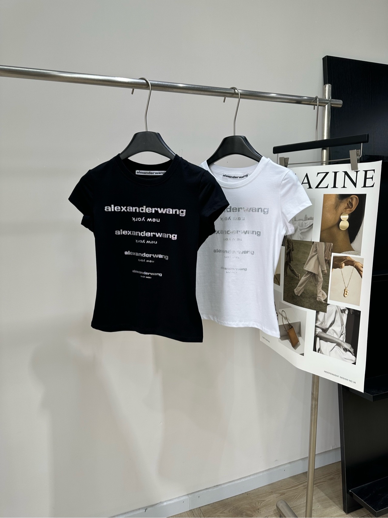NO:866397,[AW black and white multi-row letters with rhinestones, round neck short-sleeve T] Fabric cotton + spandex Color black, white Alexander Wang's diamond T-shirt has a slim fit and short design, soft cotton fabric, super comfortable to wear in summer!  The chest is decorated with multiple rows of brand logos and sparkling diamonds. The blingbling is super eye-catching in the sun. The white is versatile and the black is cool. Pair it with high-waisted jeans or short skirts. You can easily get the hot girl style or simple style. It can be easily worn in daily outings and music festivals. Fashionable and practical!  Flat size S Shoulder width 34, bust 76 stretch, length 48, sleeve length 11 M Shoulder width 35, chest 80 stretch, length 49, sleeve length 12 L Shoulder width 36, bust 84 stretch, length 50, sleeve length 13 Manual measurement will have an error of 2~3cm, which is within the normal range, skirts, jeans, T-shirts, tees, t-shirts,19860909【AW黑白多排字母烫钻圆领短袖T】 面料棉+氨纶 颜色黑色、白色 Alexander Wang这款闪钻T恤 修身短款设计,柔软棉质面料 夏天穿超舒服！ 胸前多排品牌Logo+闪钻装饰, 阳光下blingbling超吸睛 白色百搭,黑色酷感 配高腰牛仔裤or短裙 轻松get辣妹风or简约风 日常出街、音乐节都能轻松驾驭 时髦又实用！ 平铺尺码 S肩宽34,胸围76弹力,衣长48,袖长11 M肩宽35,胸围80弹力,衣长49,袖长12 L肩宽36,胸围84弹力,衣长50,袖长13 手工测量会有2~3cm误差属于正常范围,,skirts,jeans,T-shirt,tees，t-shirt,,Women's clothing