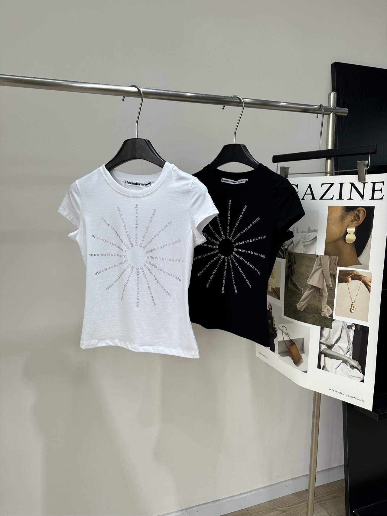 NO:866435,[AW black and white luminous hot diamond letters round neck short-sleeved T-shirt] Fabric cotton + spandex Color white, black Alexander Wang 26SS series hot diamond T-shirt The material is soft and comfortable, and it is great to wear close to the body!  Radial hot diamond letters on the front, blingbling under the light are super eye-catching. Full marks for recognition. Slim-fitting cut with straight shoulders, classic and versatile in black. The white model is fresh and simple, with a round neck design suitable for many occasions. Pair with wide-leg pants, short skirts or sneakers. Easily switch between lazy, hot girl and street style. It can be easily worn for daily commuting, shopping and parties!  Flat size S Shoulder width 34, bust 76 stretch, length 48, sleeve length 11 M Shoulder width 35, chest 80 stretch, length 49, sleeve length 12 L Shoulder width 36, bust 84 stretch, length 50, sleeve length 13 Manual measurement will have an error of 2~3cm, which is within the normal range, sneakers, skirts, T-shirts, tees, t-shirts,19860909【AW黑白发光烫钻字母圆领短袖T】 面料棉+氨纶 颜色白色、黑色 Alexander Wang 26SS系列烫钻T恤 材质柔软舒适,贴身穿着超赞！ 正面放射状烫钻字母,灯光下blingbling超吸睛 辨识度满分 正肩修身剪裁,黑色款经典百搭 白色款清新简约,圆领设计适合多种场合 搭配阔腿裤、短裙或运动鞋 轻松切换慵懒、辣妹、街头风 日常通勤、逛街、聚会都能轻松驾驭！ 平铺尺码 S肩宽34,胸围76弹力,衣长48,袖长11 M肩宽35,胸围80弹力,衣长49,袖长12 L肩宽36,胸围84弹力,衣长50,袖长13 手工测量会有2~3cm误差属于正常范围,,sneakers,skirts,T-shirt,tees，t-shirt,,Women's clothing