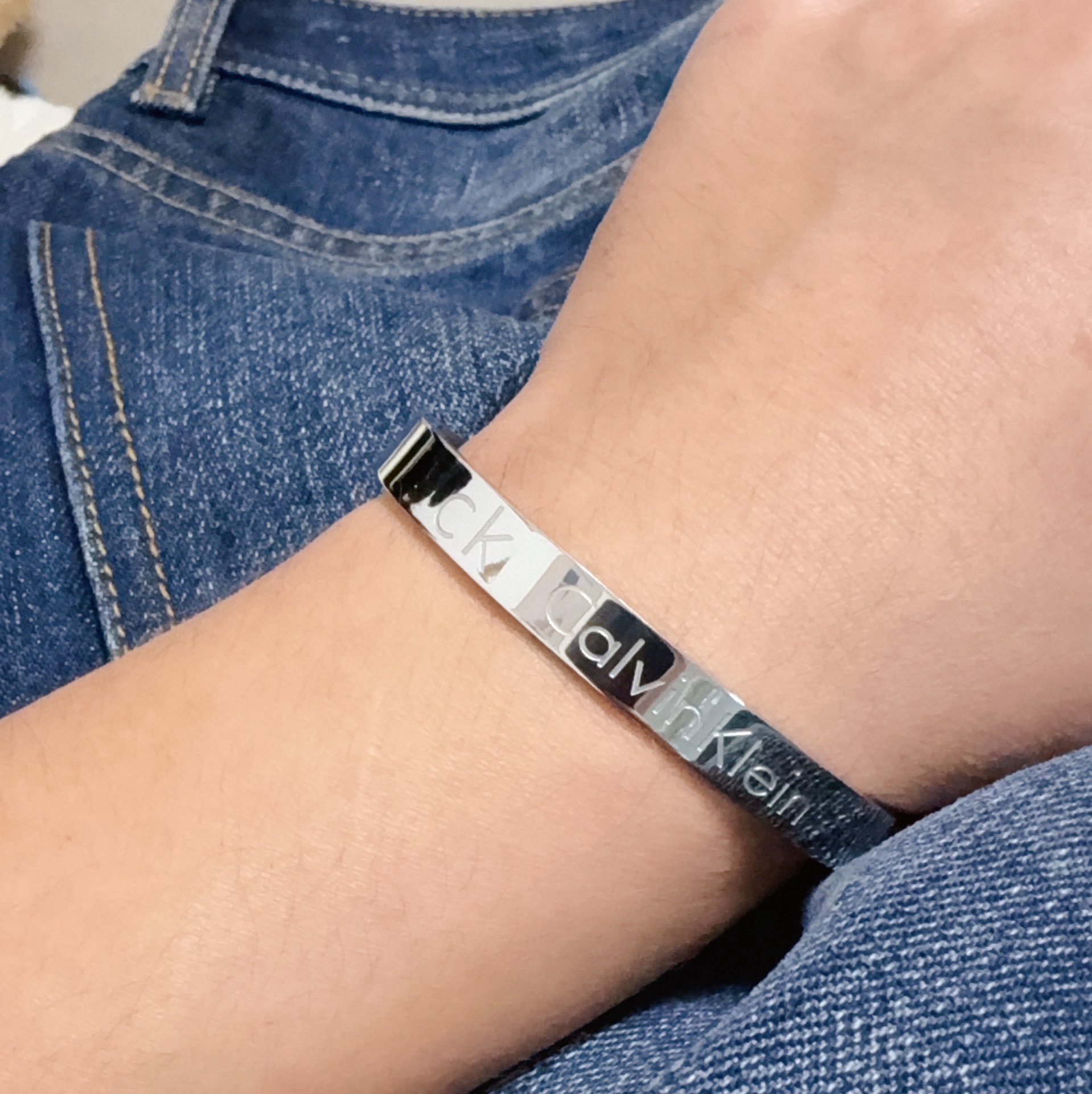 Calvin Klein CK Logo Engraved Bangle bracelet Silver Gold Rose Gold polished metal no gemstones 19cm