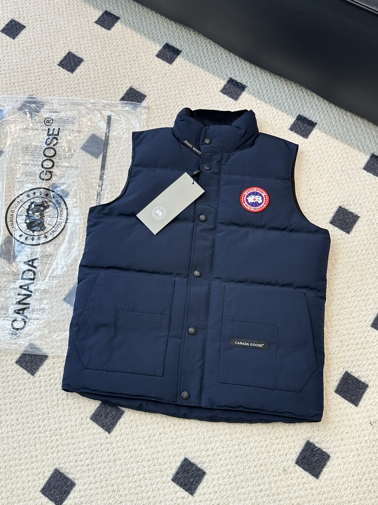 Canada Goose Fake
 Clothing Waistcoats Black Blue Red Sky White