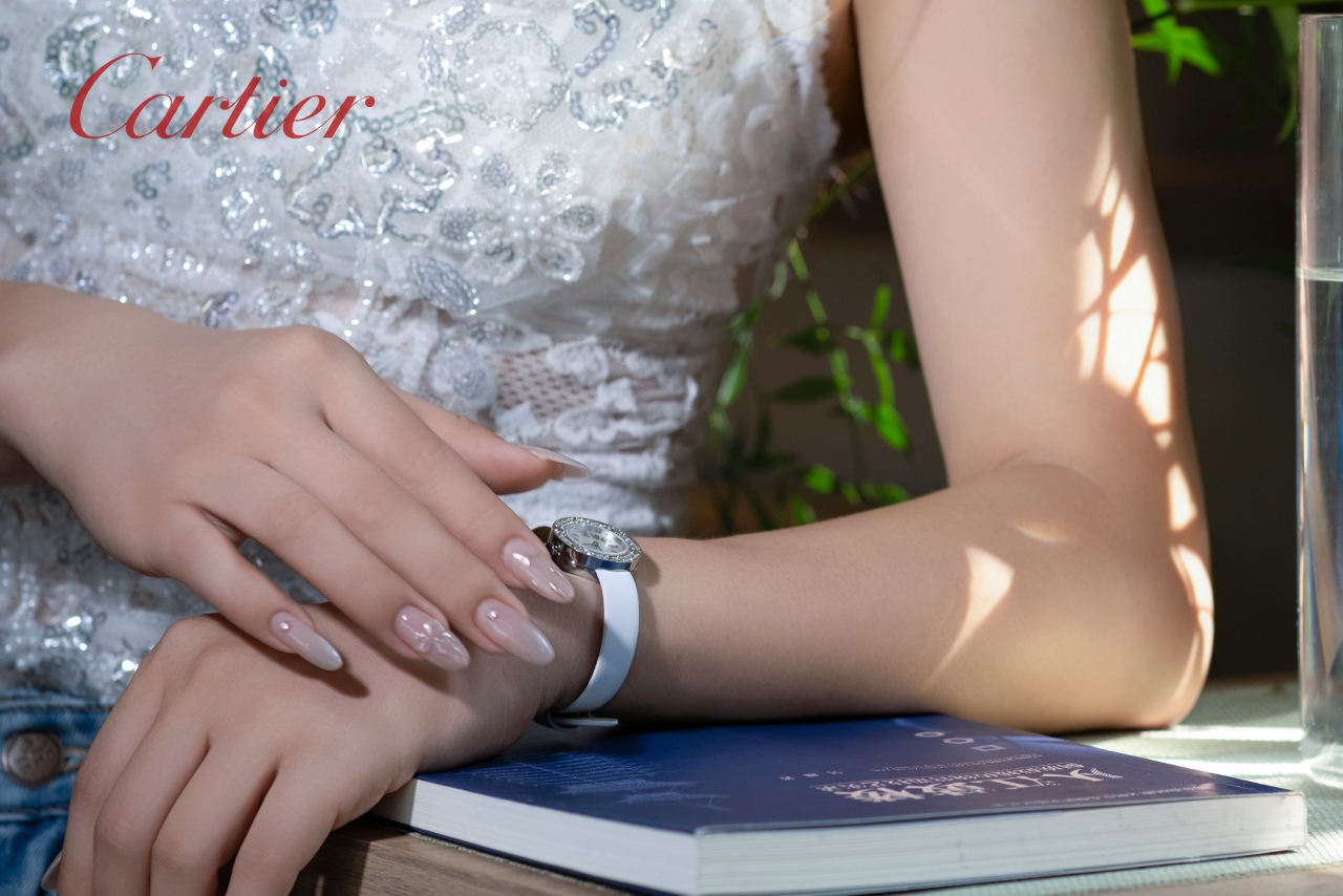 Cartier Love Watch silver diamond-set bezel white dial white leather strap 27mm Women's Quartz