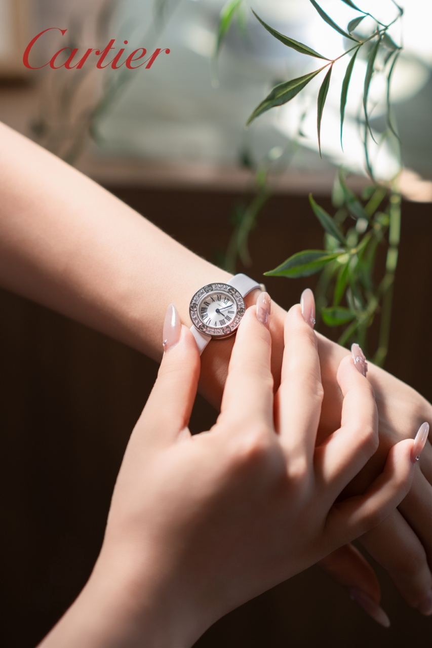 Cartier Love Watch silver diamond-set bezel white dial white leather strap 27mm Women's Quartz