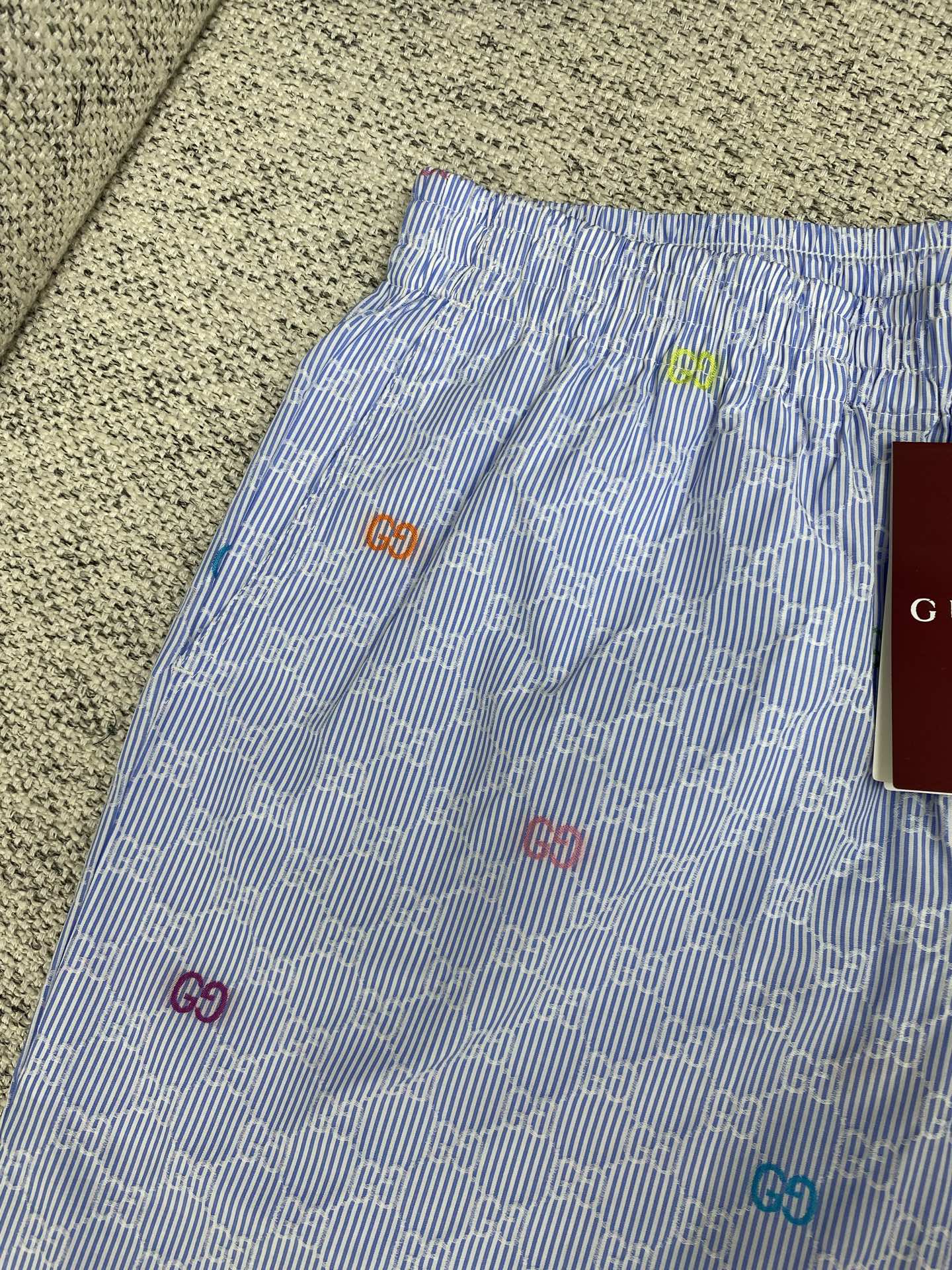 Gucci Striped Swim Shorts with Colorful GG Logo - Stylish Summer Essential 4 i1751872853566 5055 0 3
