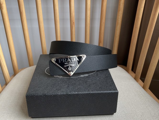 Prada Adjustable Belt with Iconic Triangle Logo Buckle - Shop Now 1 Prada Adjustable Belt with Iconic Triangle Logo Buckle - Shop Now