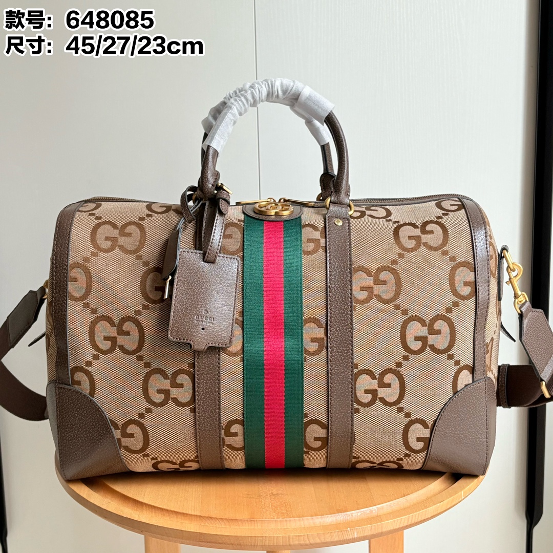 Toma real # Número de estilo: 648085 tela marrón G Tamaño: 45/27/23 Bolso de viaje clásico Ophidia equipado con correas…