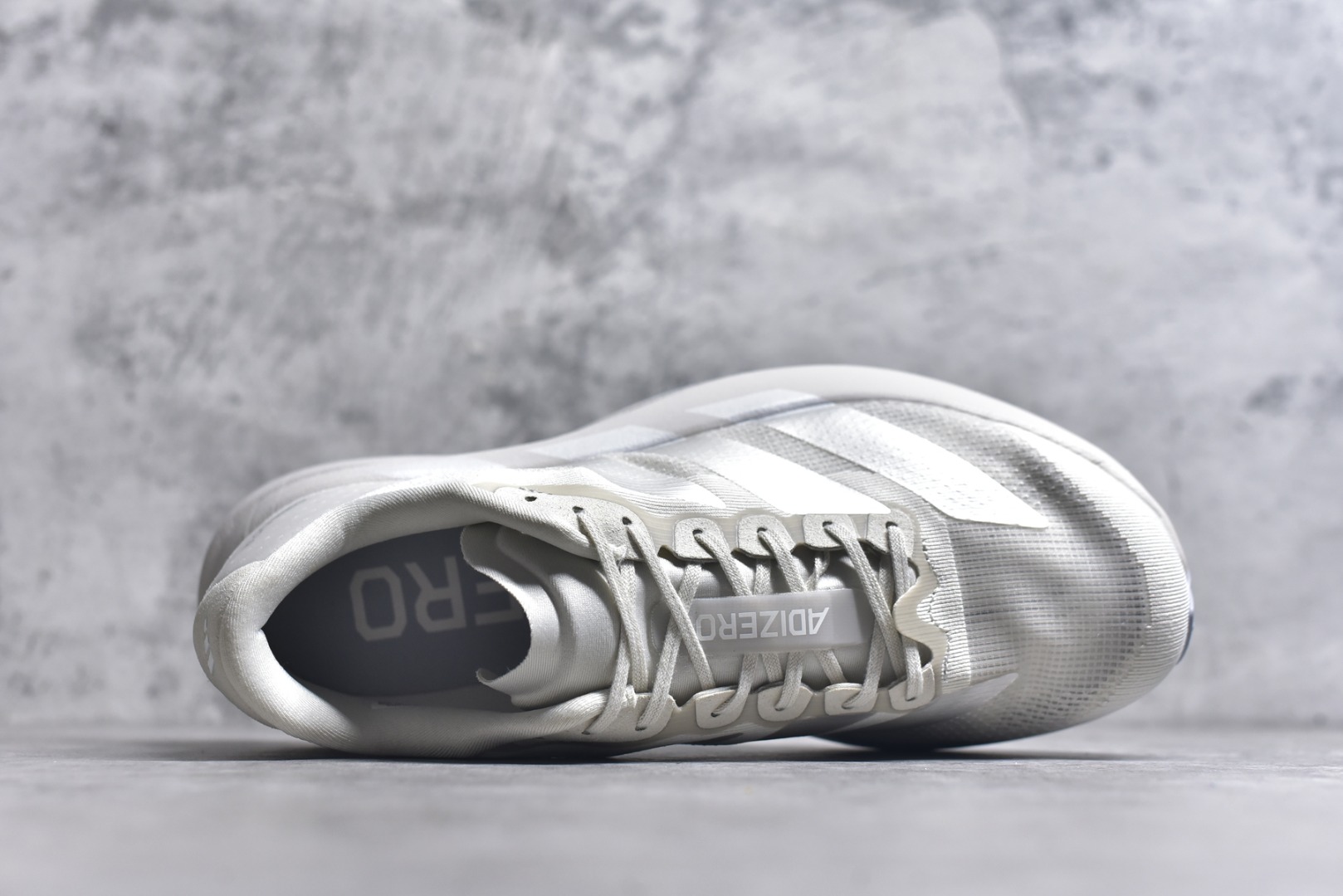 图片[4]-#AD Adizero EVO SL 马拉松竞速专业跑鞋 JR3419 CELERMESH针织网面非常轻薄 纤维间的缝隙很大 可以保证跑步时的透气、排汗效果 鞋舌直接与两侧的内衬和鞋底连接在一起 在跑步过程中不会被鞋舌的左右移动所困扰 在标准鞋带孔的基础上再拓宽一组鞋带孔 适合不同脚型的需求 突破性 EnergyRods 技术，有助于跑者实现更好的成绩 中底独特的LIGHTSTRIKE PRO泡棉材质 微弹感觉在跑步过程中给予了良好的支撑体验 对于顶级精英和高水平进阶跑者来说 ADIOS PRO是一双值得信赖的竞速比赛用鞋 尺码：39 40 40.5 41 42 42.5 43 44 44.5 45-选品中心