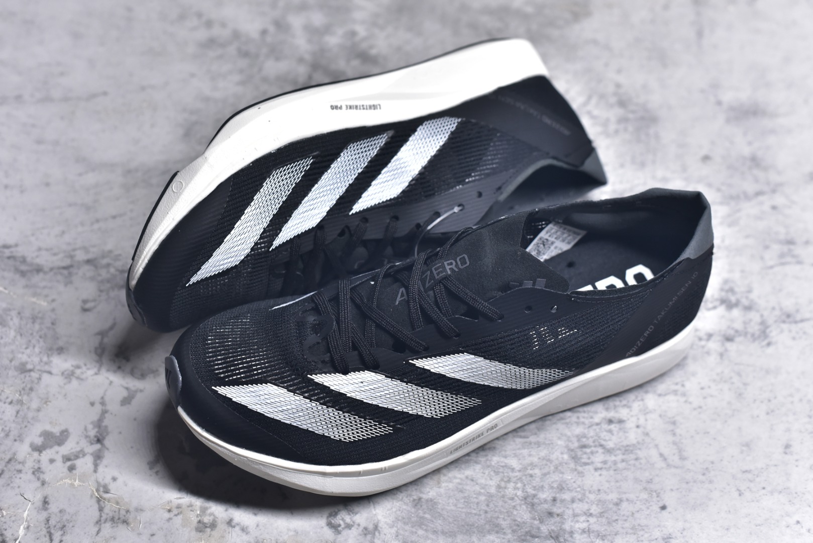 图片[7]-#Adidas Adizero Takumi Sen 10 M耐磨减震专业跑步鞋 男款 北京马拉松40周年限定。冲向目标，一路向前，不断挑战和突破自我。无论是平时训练还是马拉松，让这款adidas跑步鞋伴你畅快开跑。兼具舒适性和结构感，搭载Lightstrike科技，为步伐注入活力。 货号：IH5710 尺码：36 36.5 37.5 38 38.5 39 40 40.5 41 42 42.5 43 44 45-选品中心