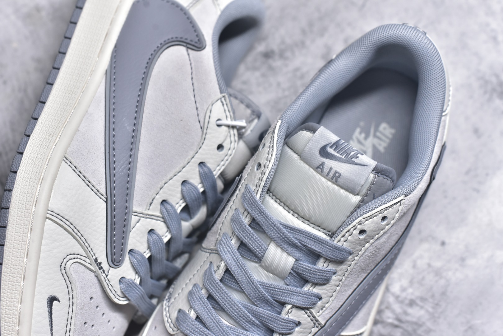 图片[9]-#Travis Scott x Fragment Design x Air Jordan 1 Low OG SP AJ1 乔1 Supreme联名-猪八高贵灰 低帮文化休闲板鞋 XZ2268-003 #多方联名合作融合了Travis Scott 独特的音乐风格，藤原浩个性的设计风格以及Jordan品牌的经典元素 使其成为一双具有独特身份和价值的鞋子 清新而立体的外观加上联名标识更突出了其独特身份 这种配色方案显示出活力和时尚感 在视觉上引人注目 鞋身的质感和细腻的细节处理使其显得高端而格调十足 这款“倒钩”联名是设计与创意完美结合 融合多方的个性风格是一款备受瞩目的潮流鞋款 尺码：36 36.5 37.5 38 38.5 39 40 40.5 41 42 42.5 43 44 44.5 45 9.E5-选品中心