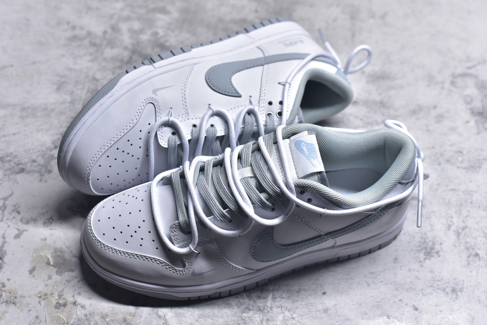 图片[7]-#NK Dunk Low 星郎 WG0528-101 大厂出品 极力推荐 原装头层材料 独家版型蒸餾加工帶來的是更好的视觉和脚感体验大厂纯原品质出货 清洁度 电绣工艺 皮料切割干净无任何毛边 细节完美 实拍调校N版已经零色差零失真 百分百还原实物色彩所见即所得 不存在货不对板色差等低级问题 选购参考实物拍摄 不混卖不参货 只用心做好货严格选品 承诺混一赔十 尺码：40 40.5 41 42 42.5 43 44 44.5 45 46-选品中心