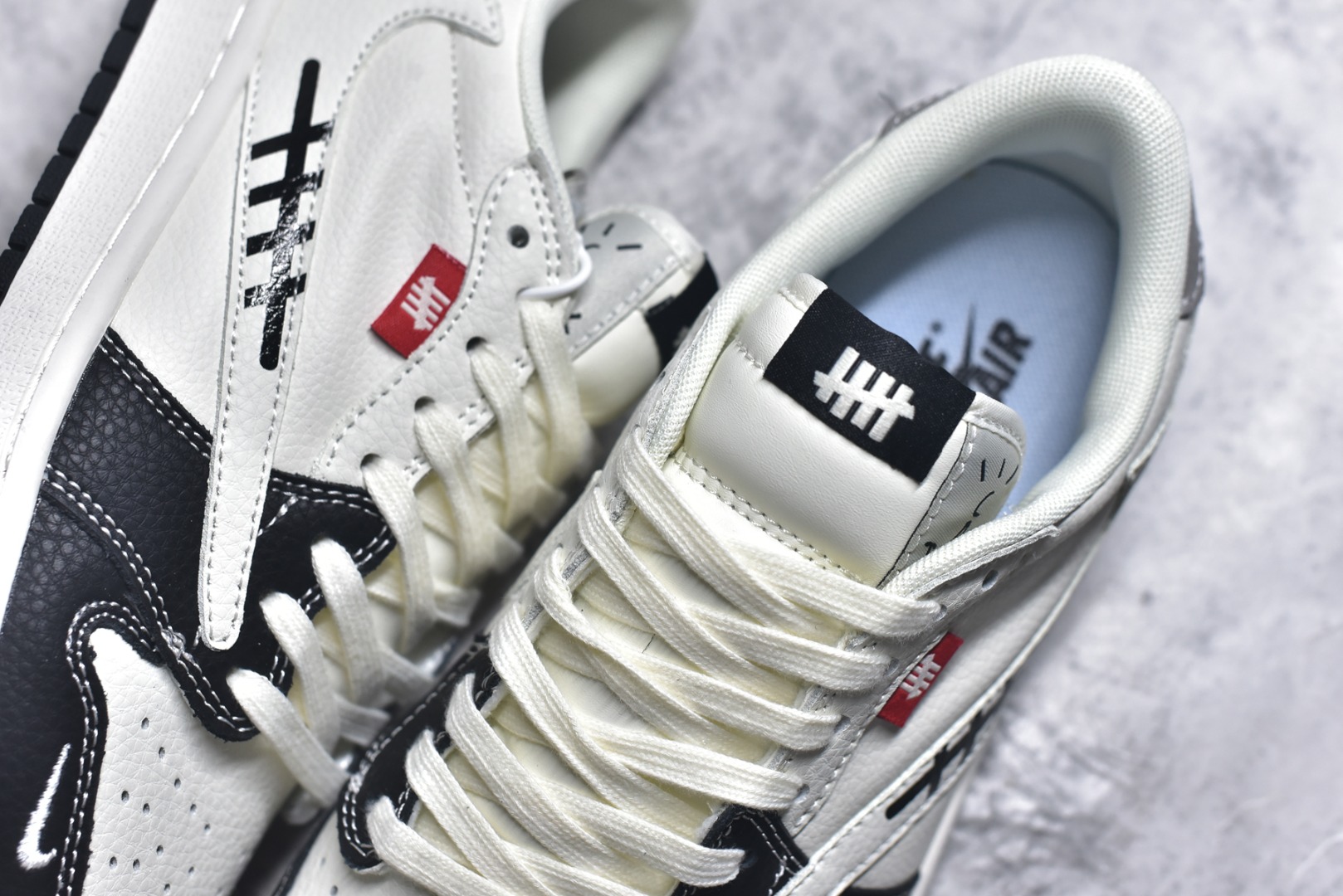 图片[9]-#海外爆款限量发售！Nike Jordan Air Jordan倒勾 “ UN联名——米黑灰拼接” 高端定制 低帮 复古 减震 防滑 耐磨 篮球鞋 定制鞋盒 大厂纯原品质出货 超高清洁度 皮料切割干净无任何毛边 细节完美 货号：JW1188-169 尺码：36 36.5 37.5 38 38.5 39 40 40.5 41 42 42.5 43 44 44.5 45-选品中心