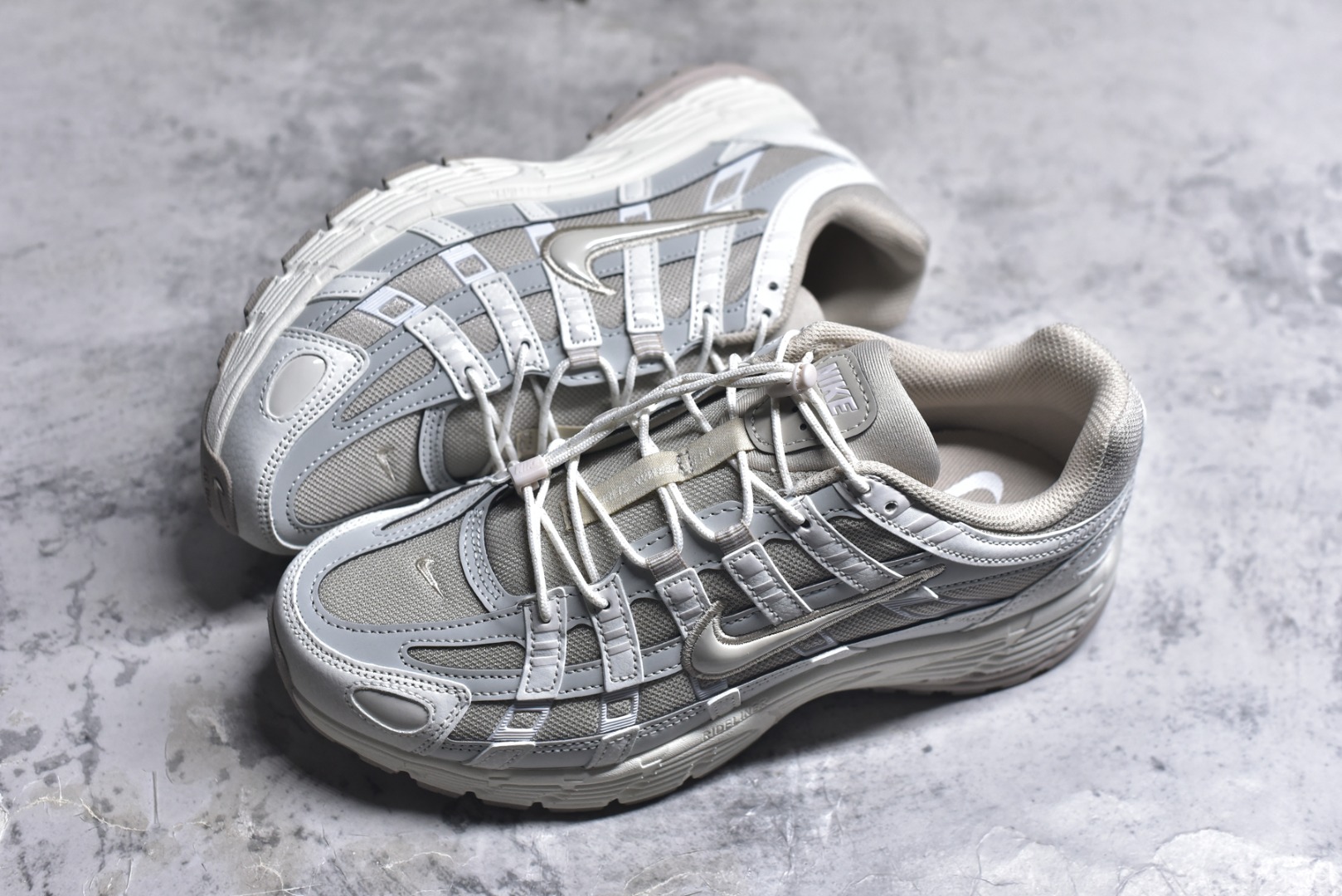 图片[7]-#NK P-6000 系列低帮复古老爹风休闲运动舒适慢跑鞋 IM5237-100 融合 Pegasus 过往运动鞋设计 助力 21 世纪早期跑步运动跃升时尚新高度 采用透气网眼布、运动风格线条和耐穿覆面 兼具吸睛外观和舒适感受 中底泡绵以田径赛道为灵感 打造厚实设计 缔造出众缓震性能 尺码：36 36.5 37.5 38 38.5 39 40 40.5 41 42 42.5 43 44 44.5 45-选品中心