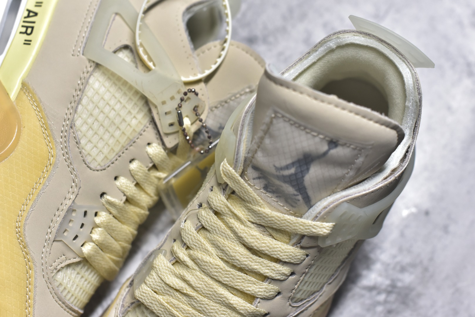 图片[9]-#Off-White™ x Air Jordan AJ4 Retro\”Cream/Sail\” OW联名白帆 CV9388-100 市售最强白帆 高端零售指定版本 采用原厂韩国进口网纱 全鞋电脑定位针车 原档案精准数据分码段标语 独家原装大底注意带氧化效果 \”双面Air OW\”字样精准对位 正确中底钢印 原厂特供皮料加持 确保原汁原味 完美呈现四代版型 一比一鞋头弧度高度鞋身弧度 数据细节工艺流程均保持原鞋一致 原厂TPU网格鞋带扣 正确内里网布 菱角分明不变形无多余毛边 柔软性质感一致于原鞋 原厂织唛标 原厂飞人电绣工艺 尾指中部跳三针 独家绑鞋带手法 印刷中底布 四线拉帮 米色美纹纸贴合固定 进口港宝加持 后跟自然饱满 全鞋荧光划线卡点 追求极致完美 每一双都是工艺品 多重QC质检 超越公司货的品控标准 实实在在的免检产品 尺码：36-48-选品中心