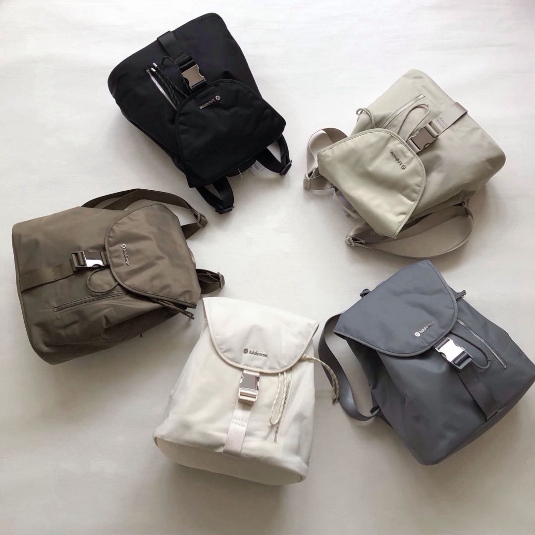 Featuring a classic bucket silhouette, this backpack is secured with a - Bag 2