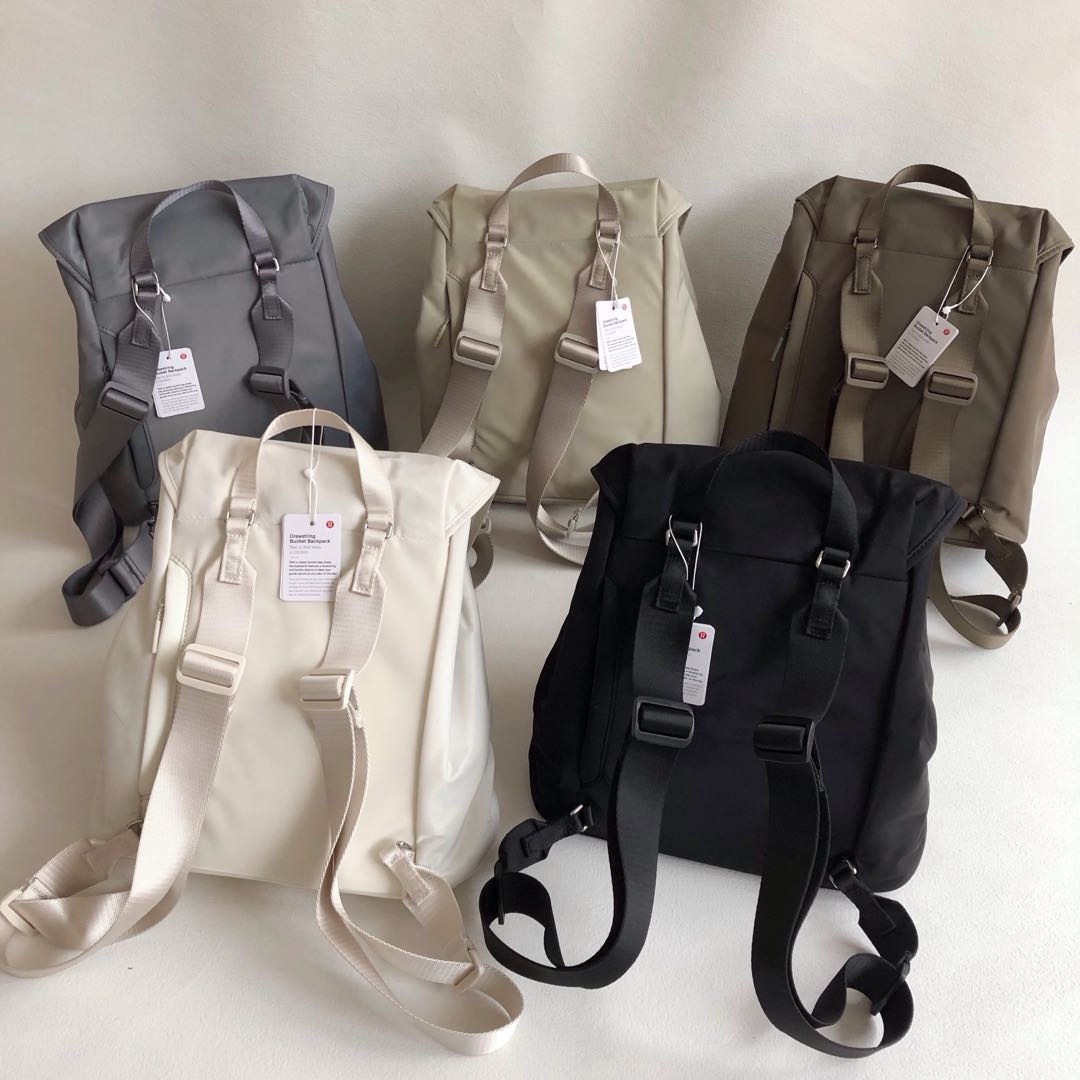 Featuring a classic bucket silhouette, this backpack is secured with a - Bag 4