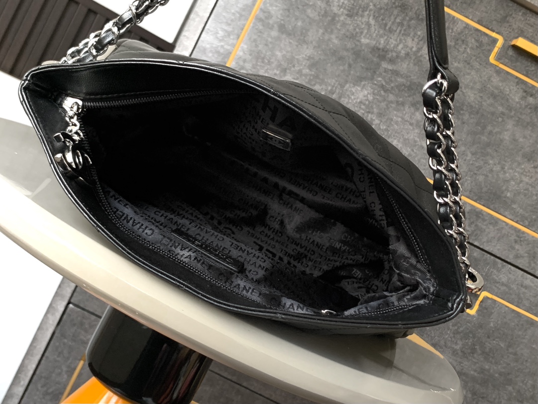 Chanel Quilted Lambskin Classic Flap Handbag