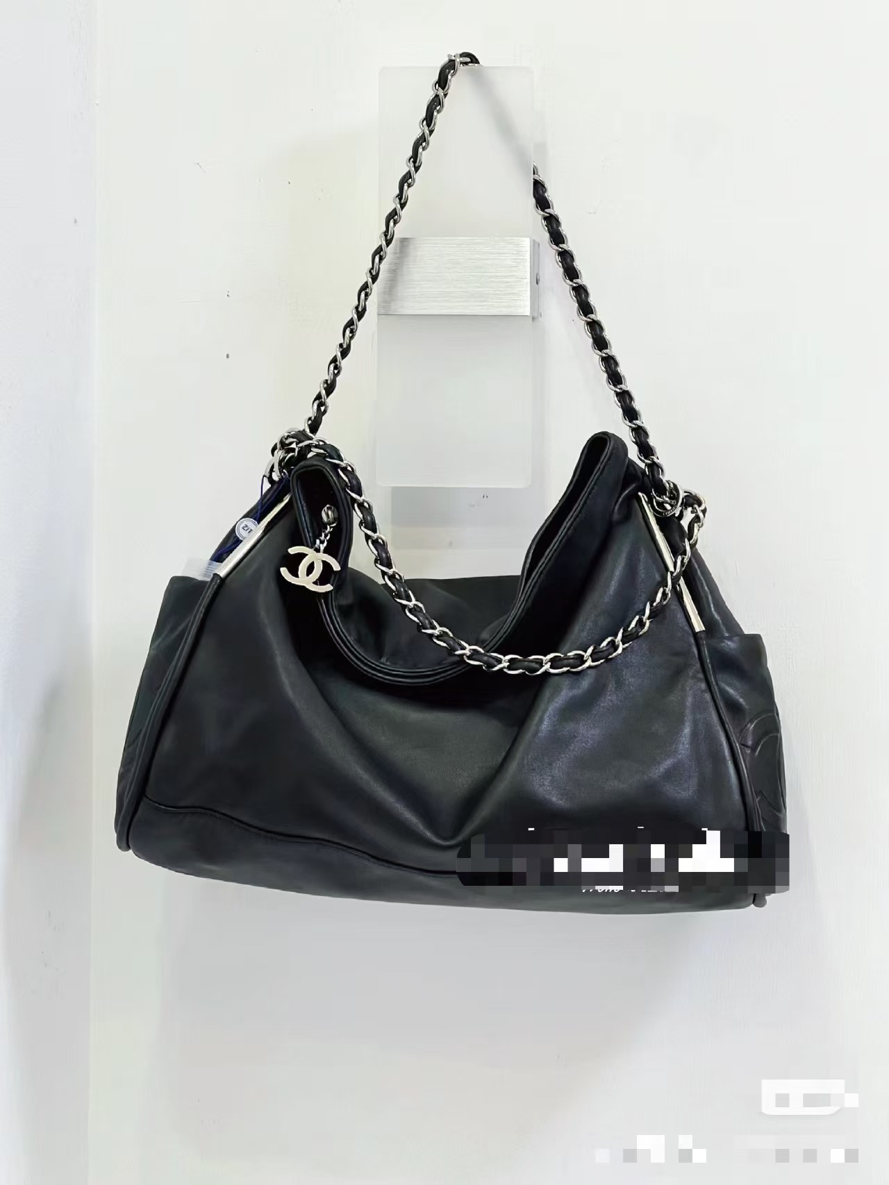 This black and silver Hobo bag looks absolutely stunning when worn - Bag