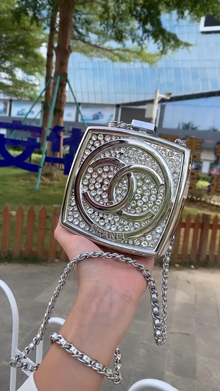 A stage to shine by day, CHANEL exudes even greater nobility and - Bag