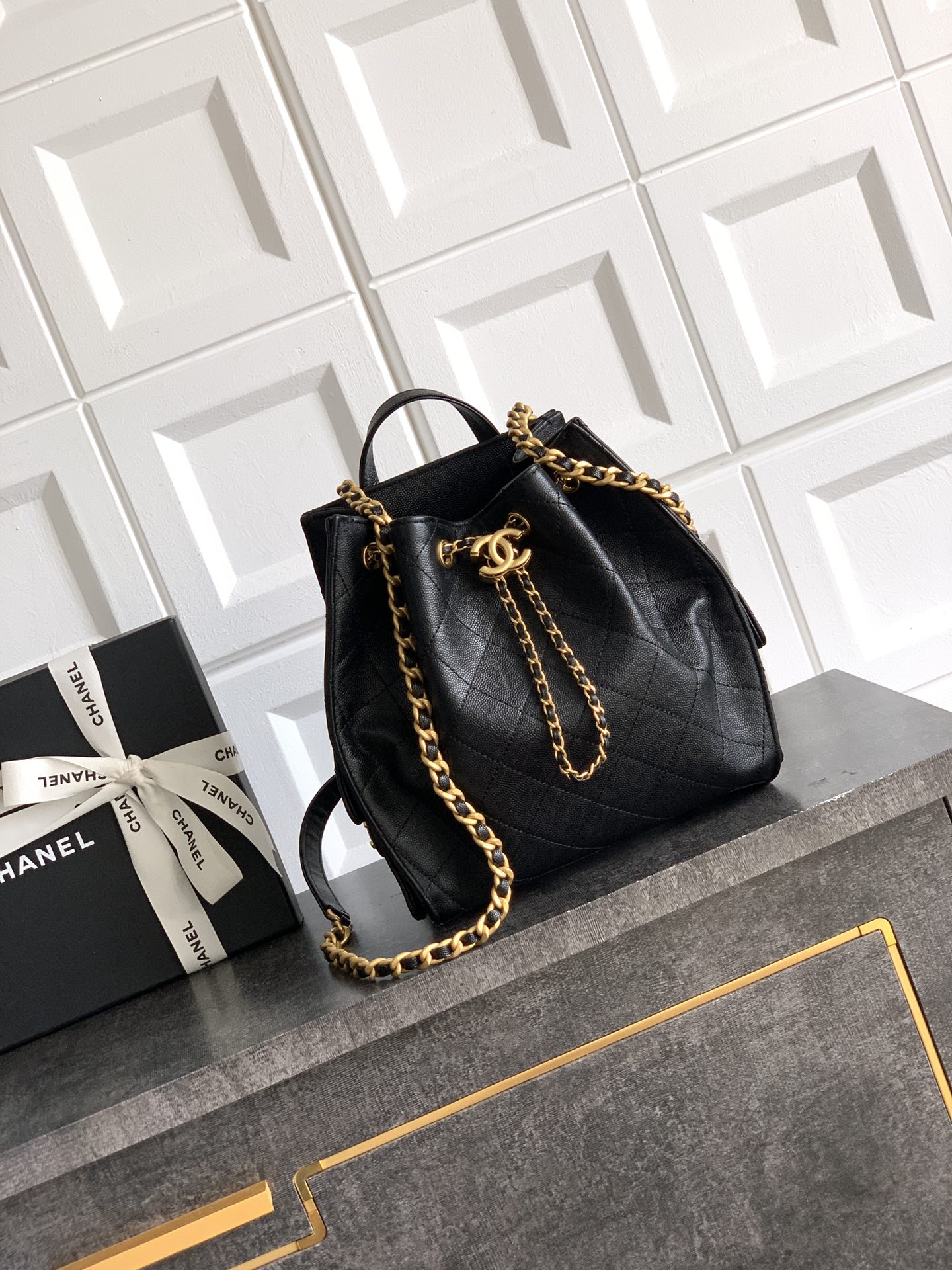 Chanel 25B Black Leather Backpack with Gold Chain Accents - Stylish & Functional