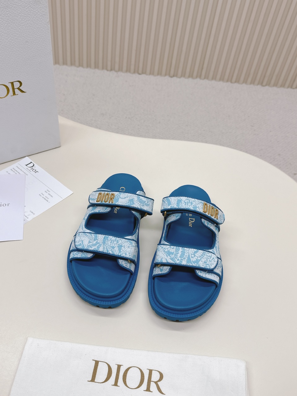 NO:261112,Hot Price This black sheep leather DiorAct sandals are stylish. They are made of extra light and comfortable leather with an insole that fits the foot. The upper strip is made of Velcro and is decorated with a gold-finished metal 