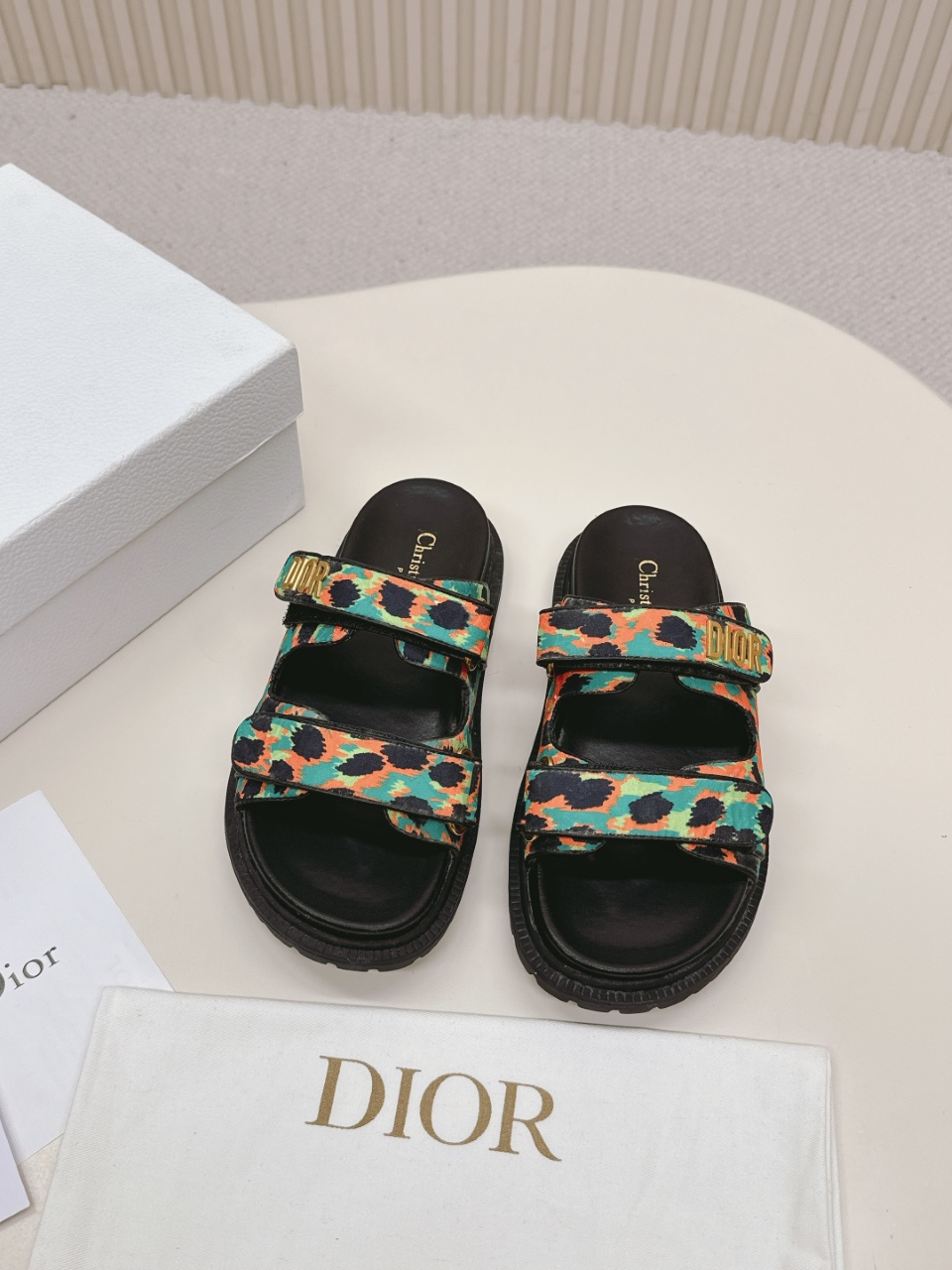 NO:261093,Hot Price This black sheep leather DiorAct sandals are stylish. They are made of extra light and comfortable leather with an insole that fits the foot. The upper strip is made of Velcro and is decorated with a gold-finished metal 