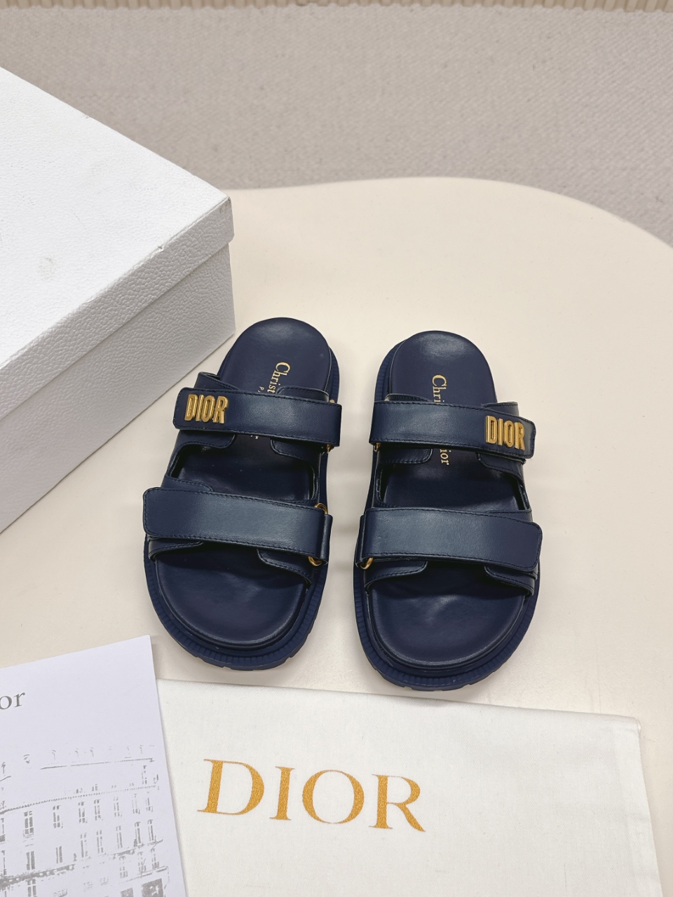 NO:261172,Hot selling price (dark blue) DIOR classic sandals This mixed-bred sheepskin DiorAct sandals are stylish. They are made of extra light and comfortable leather with an insole that fits the foot. The upper strips are velcro and are decorated with gold-finished metal 