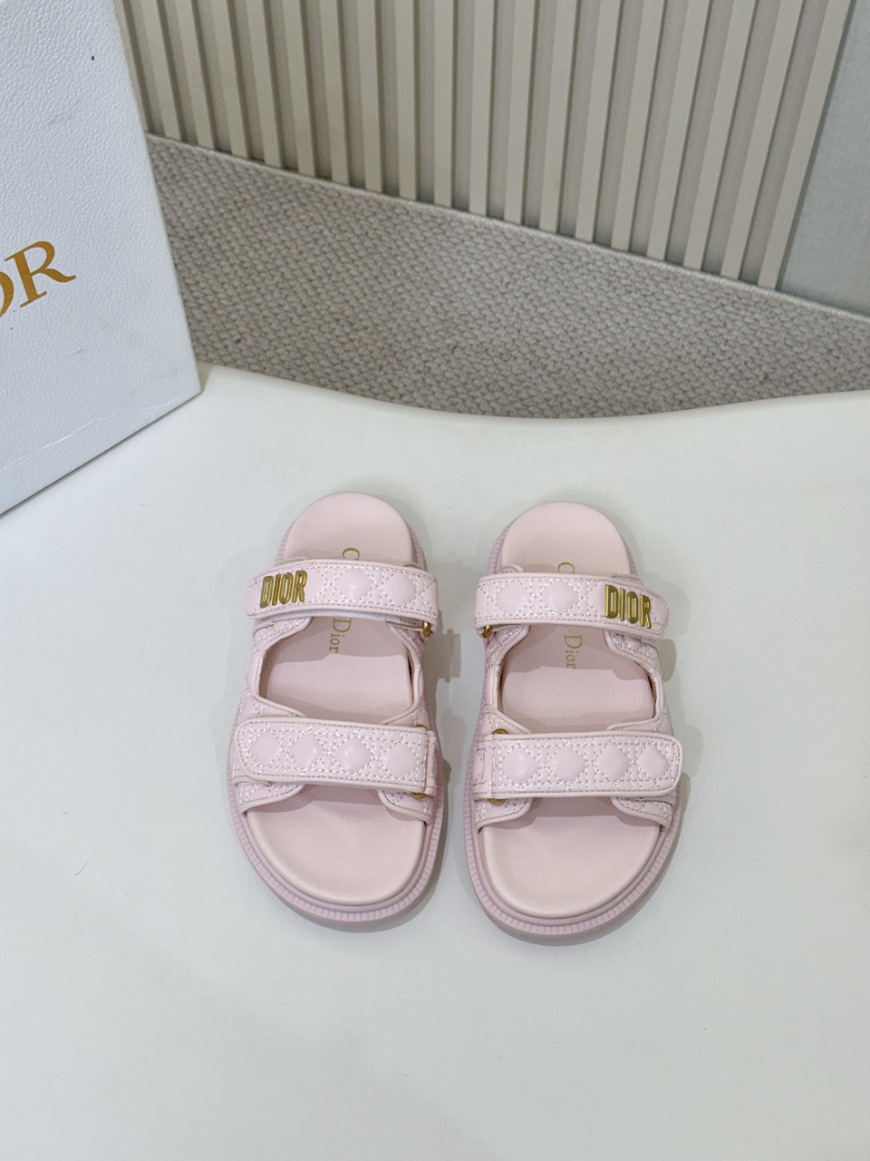 NO:261121,Hot selling price Light pink electric embroidery DIOR classic sandals This mixed-bred sheepskin DiorAct sandals are stylish in style. They are made of extra light and comfortable leather with an insole that fits the foot. The upper strip is made of Velcro and is decorated with a gold-finished metal 
