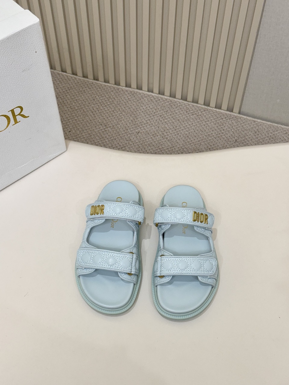 NO:261120,Hot selling price Light blue electric embroidery DIOR classic sandals This mixed-bred sheepskin DiorAct sandals are stylish in style. They are made of extra light and comfortable leather with an insole that fits the foot. The upper strip is made of Velcro and is decorated with a gold-finished metal 