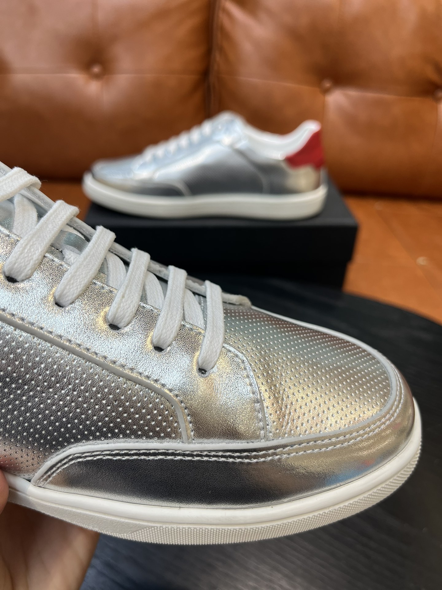 Yves Saint Laurent Metallic Leather Sneakers with Red Heel Tab 5 i1715597158 1665 7