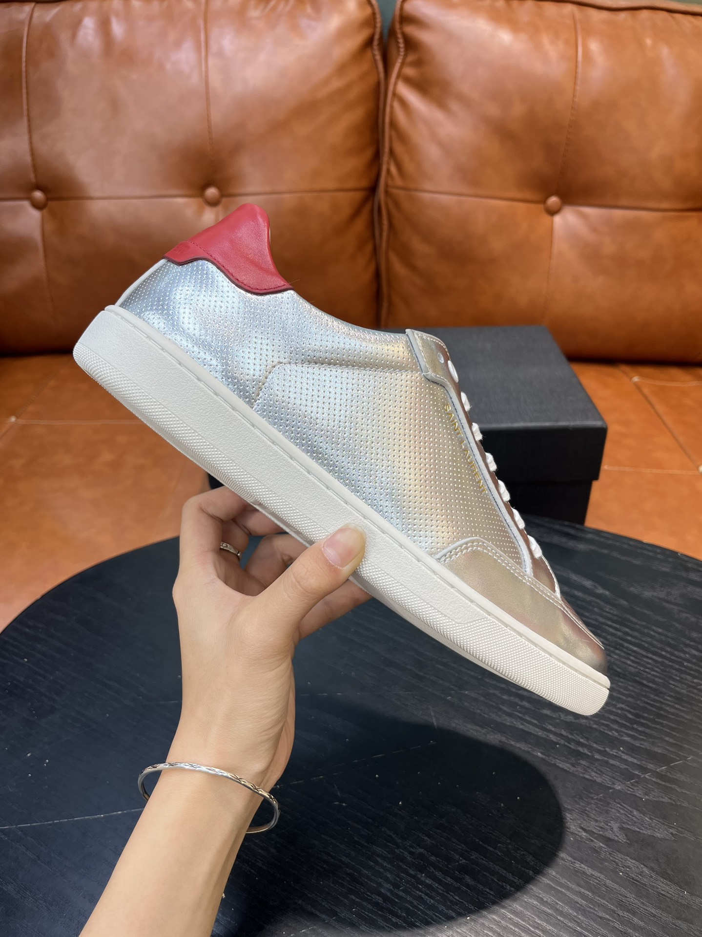 Yves Saint Laurent Metallic Leather Sneakers with Red Heel Tab 2 i1715597158 2324 6