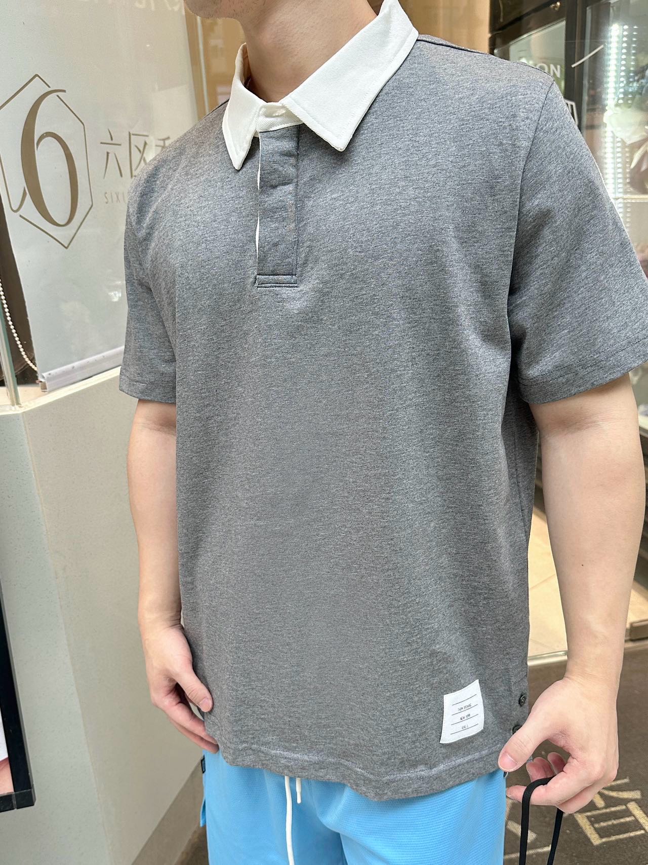 ThomBrowneTom Brown 24ss contrasting collar Polo short-sleeved upper body effe