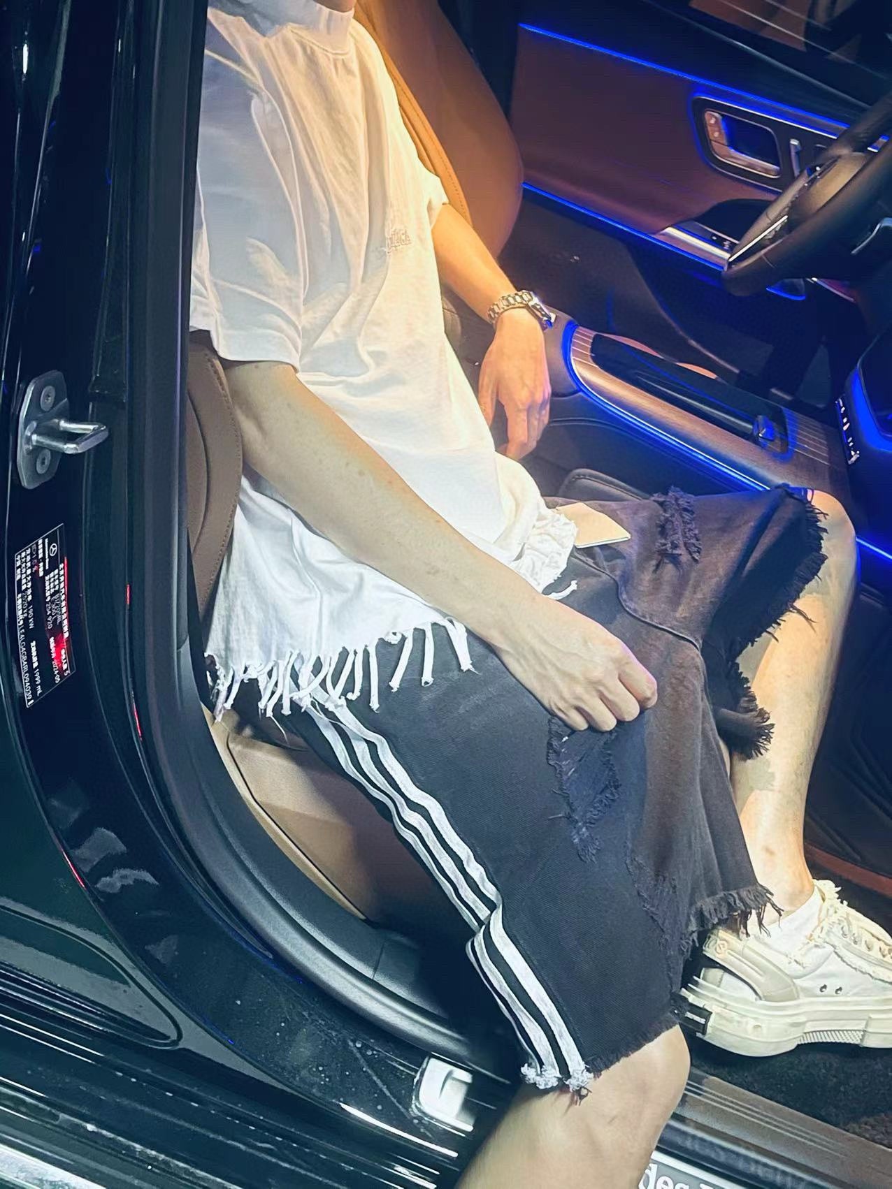 BalenciagaAdidas co-branded three-bar and holed denim shorts upper body effect
