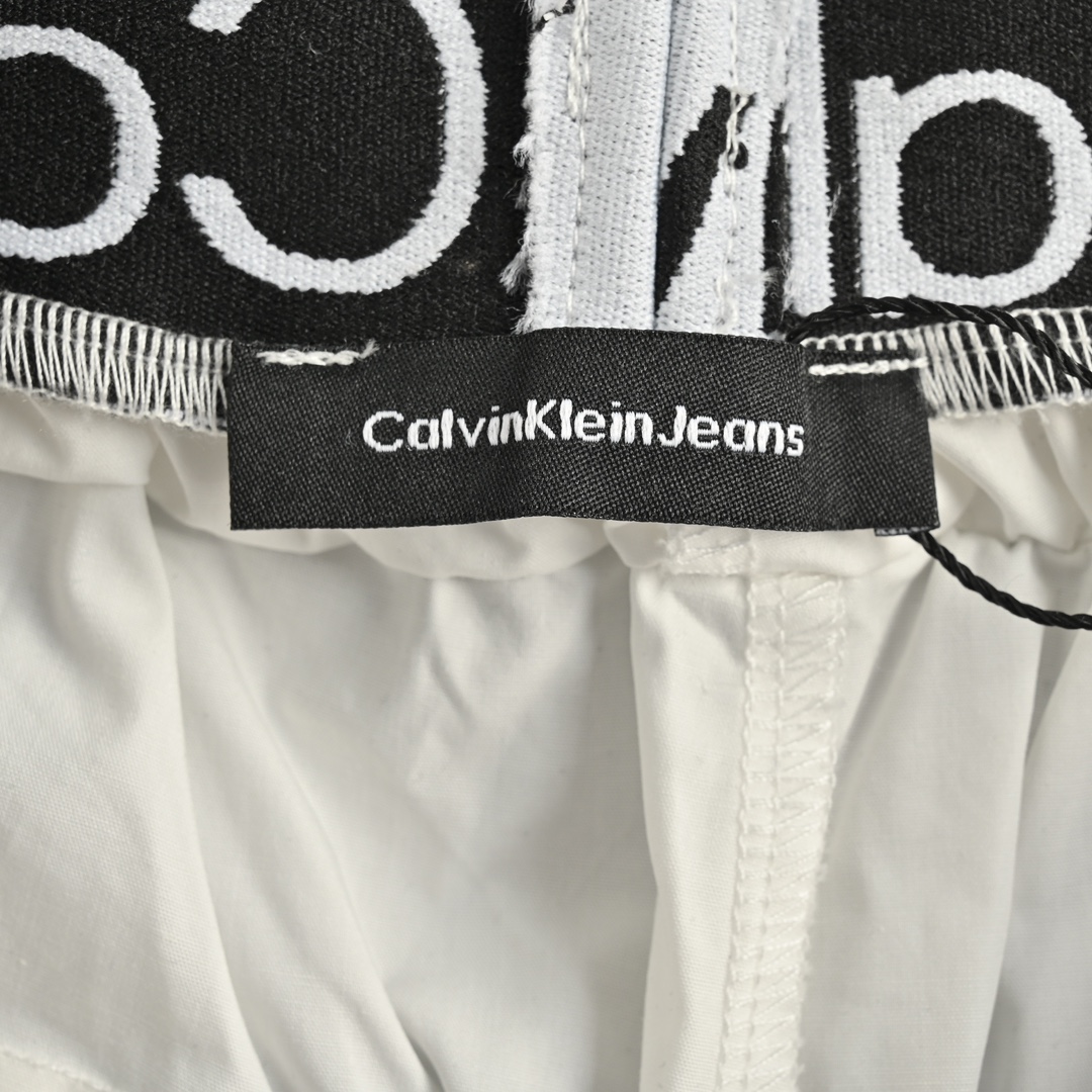 Calvin Klein CK双腰压胶字母logo梭织长裤 降落伞兵工装裤