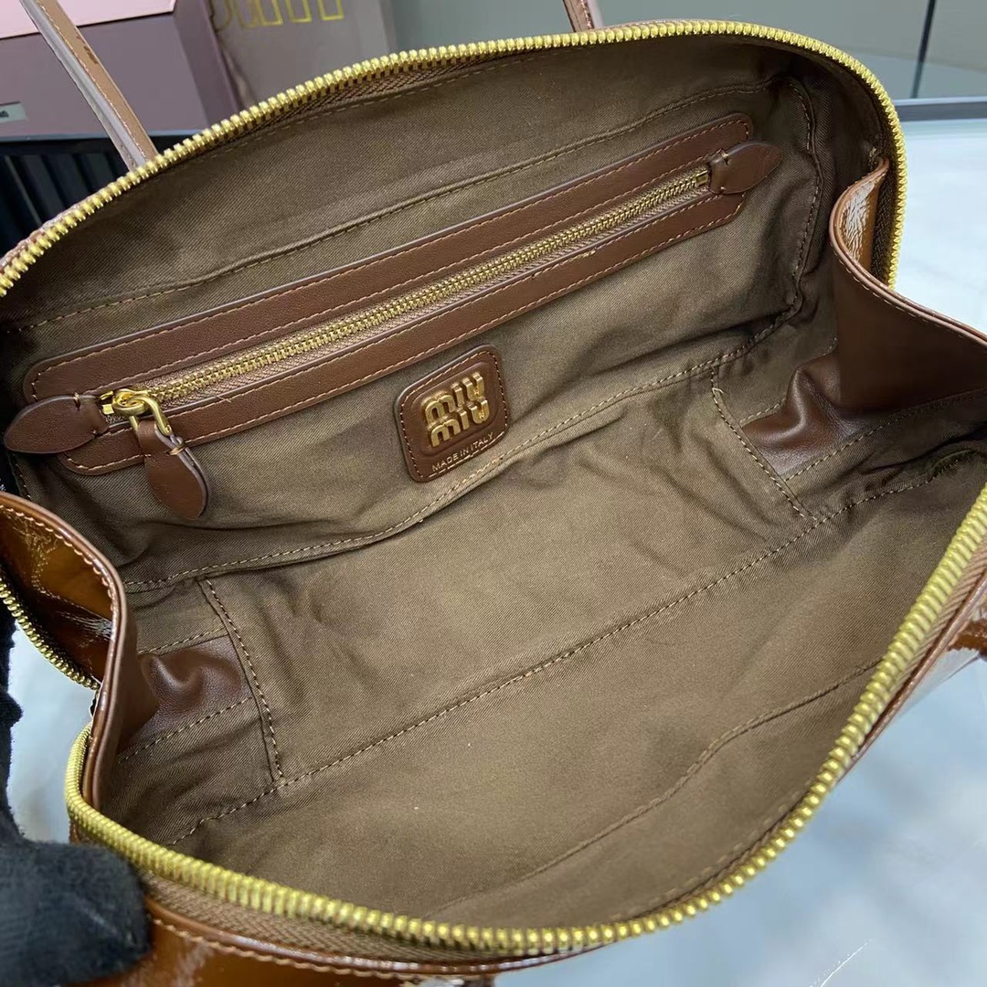 Miu Miu Beau Handbag: Retro Style, Modern Flair - Top Grain Leather, Brown 9 i1744915088 1421 0