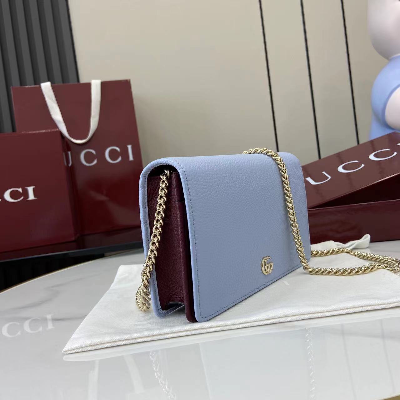Сумка-клатч Gucci с цепочкой