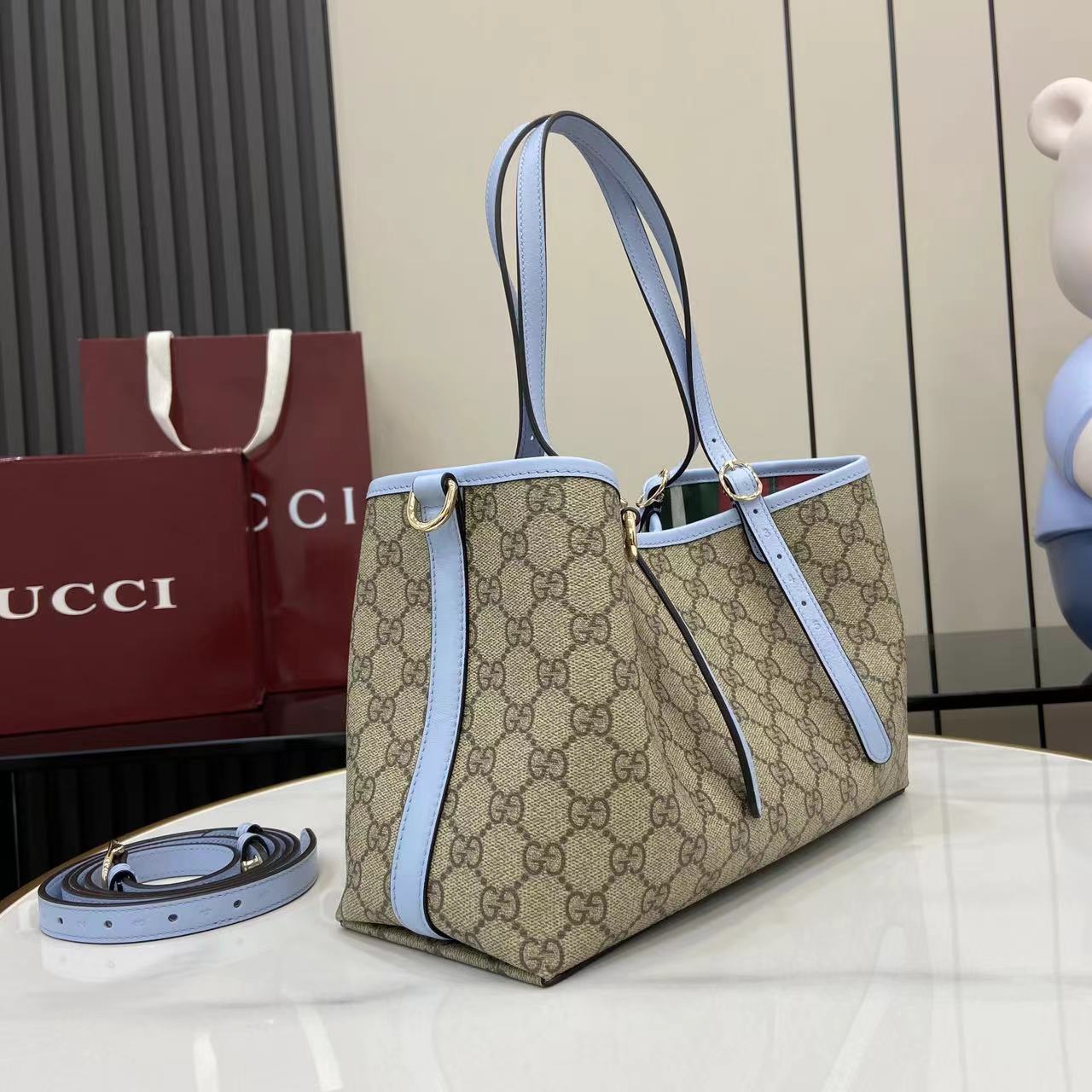 Сумка Gucci с принтом и голубыми вставками