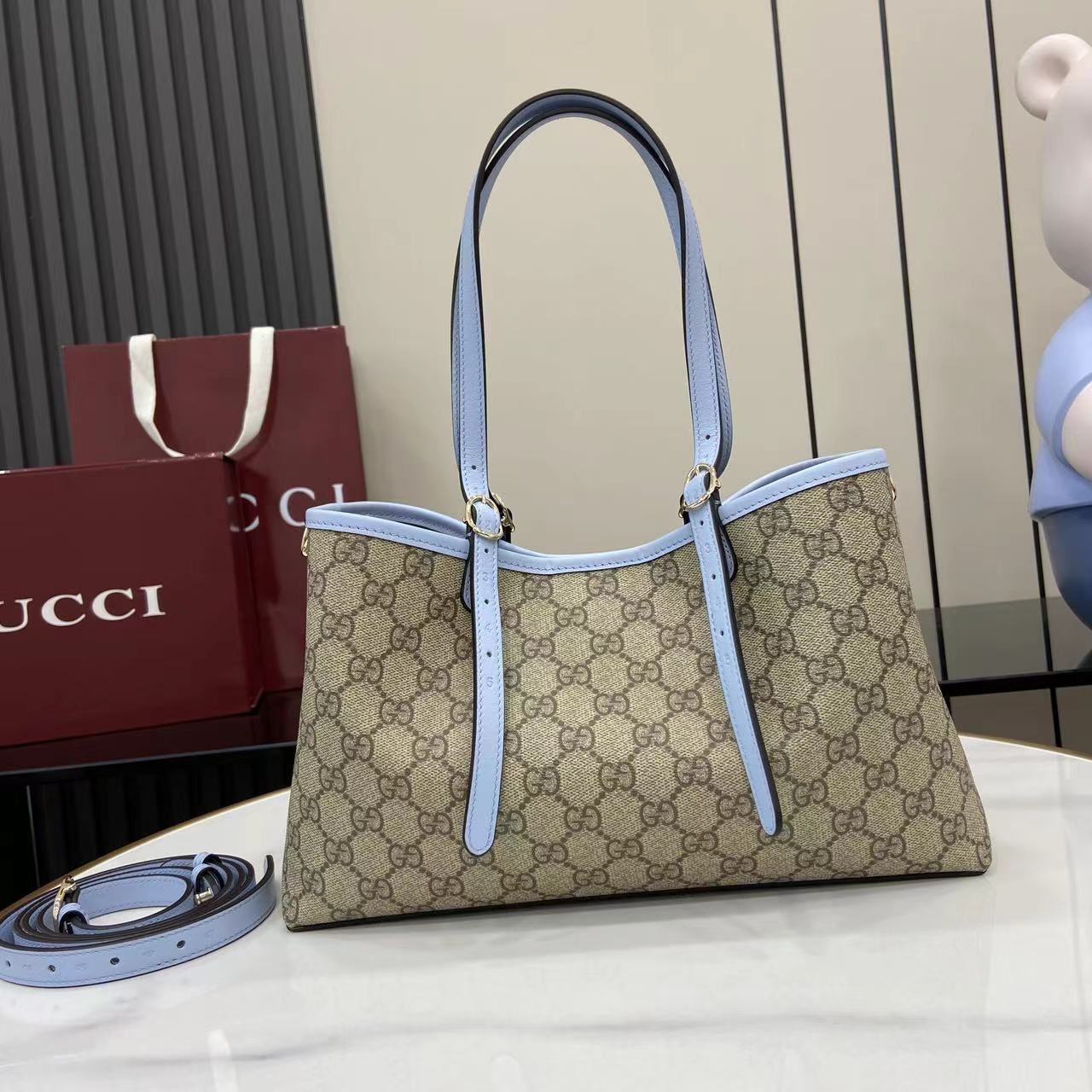 Сумка Gucci с принтом и голубыми вставками