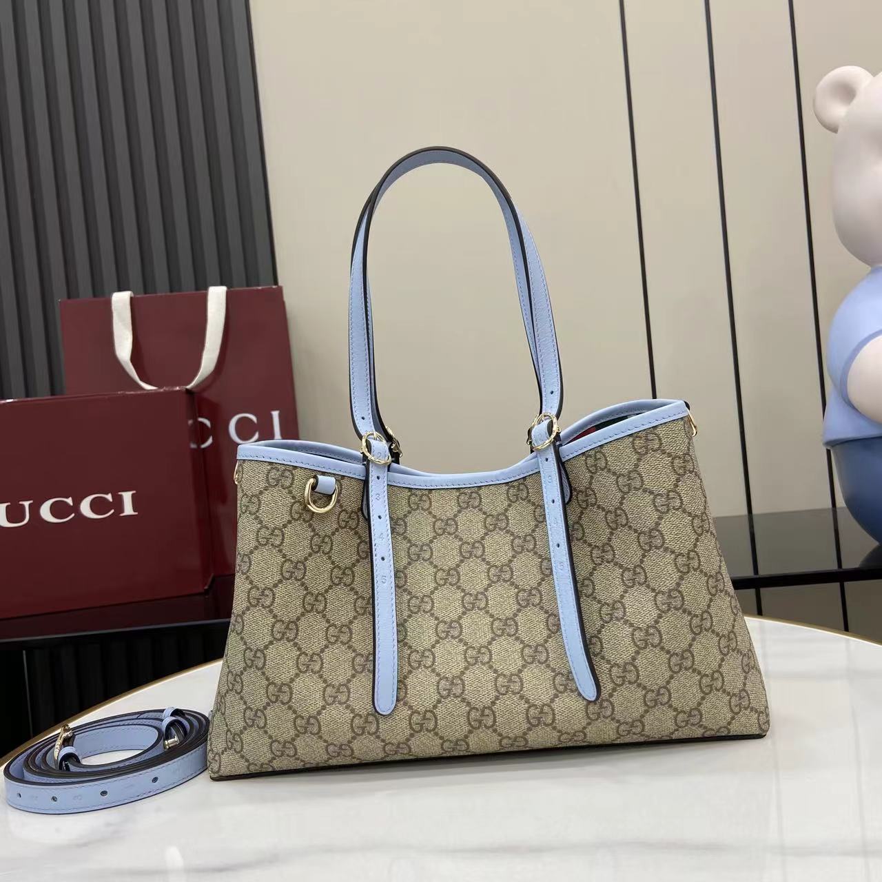 Сумка Gucci с принтом и голубыми вставками