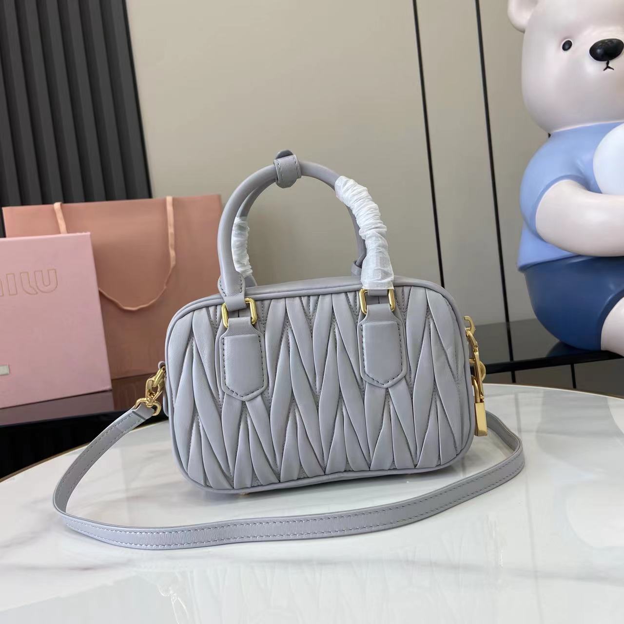 Miu Miu Arcadia Matelassé Leather Bowling Bag - Light Pink & Pearl Gray 4 i1749623826734 4948 0 2
