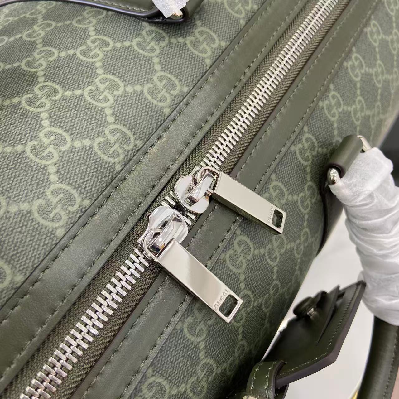 Gucci Medium Duffle Bag in Green Gucci Letter Pattern Coated Fabric 10 i1757139440655 4668 0 9
