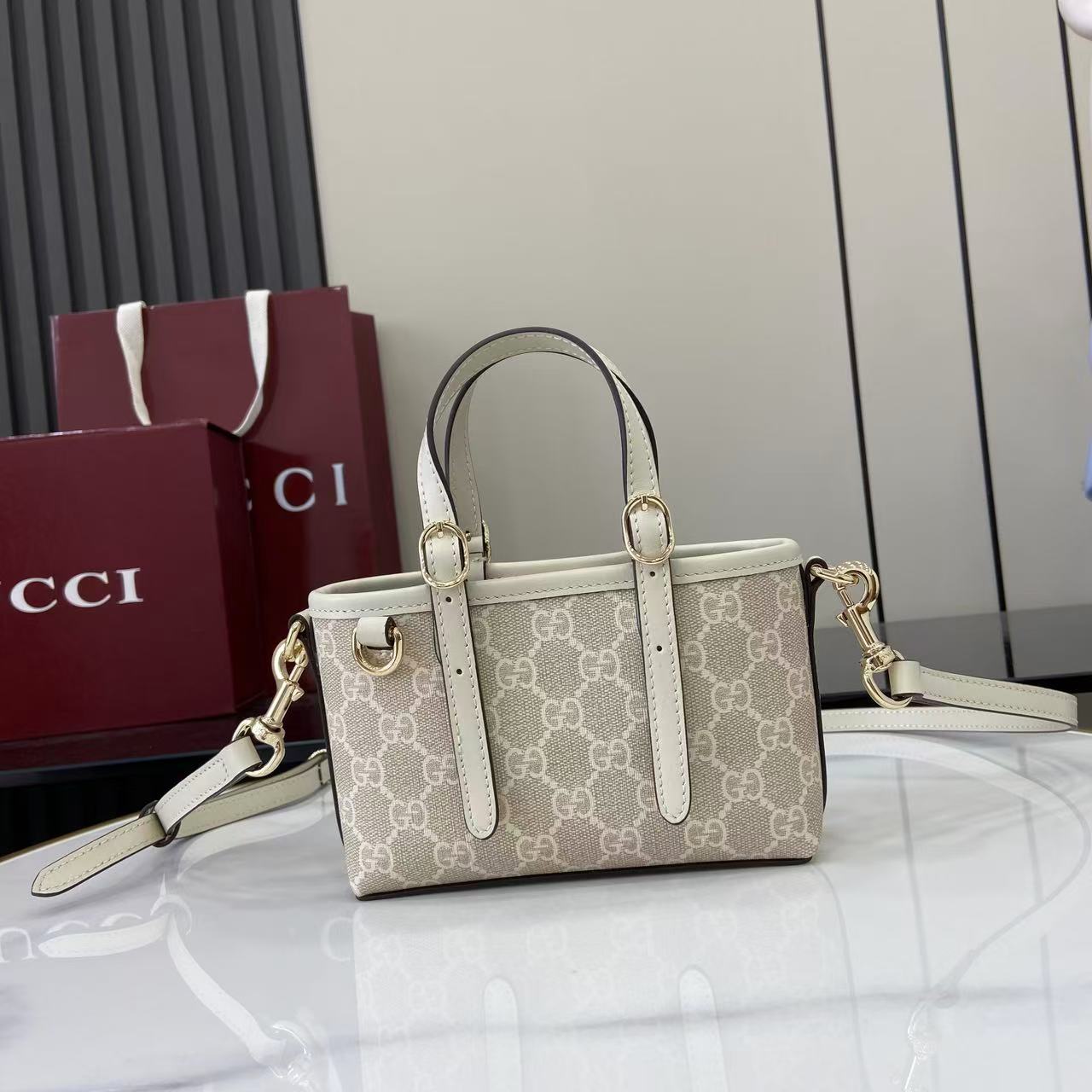 Сумка Gucci с монограммой и ремнем
