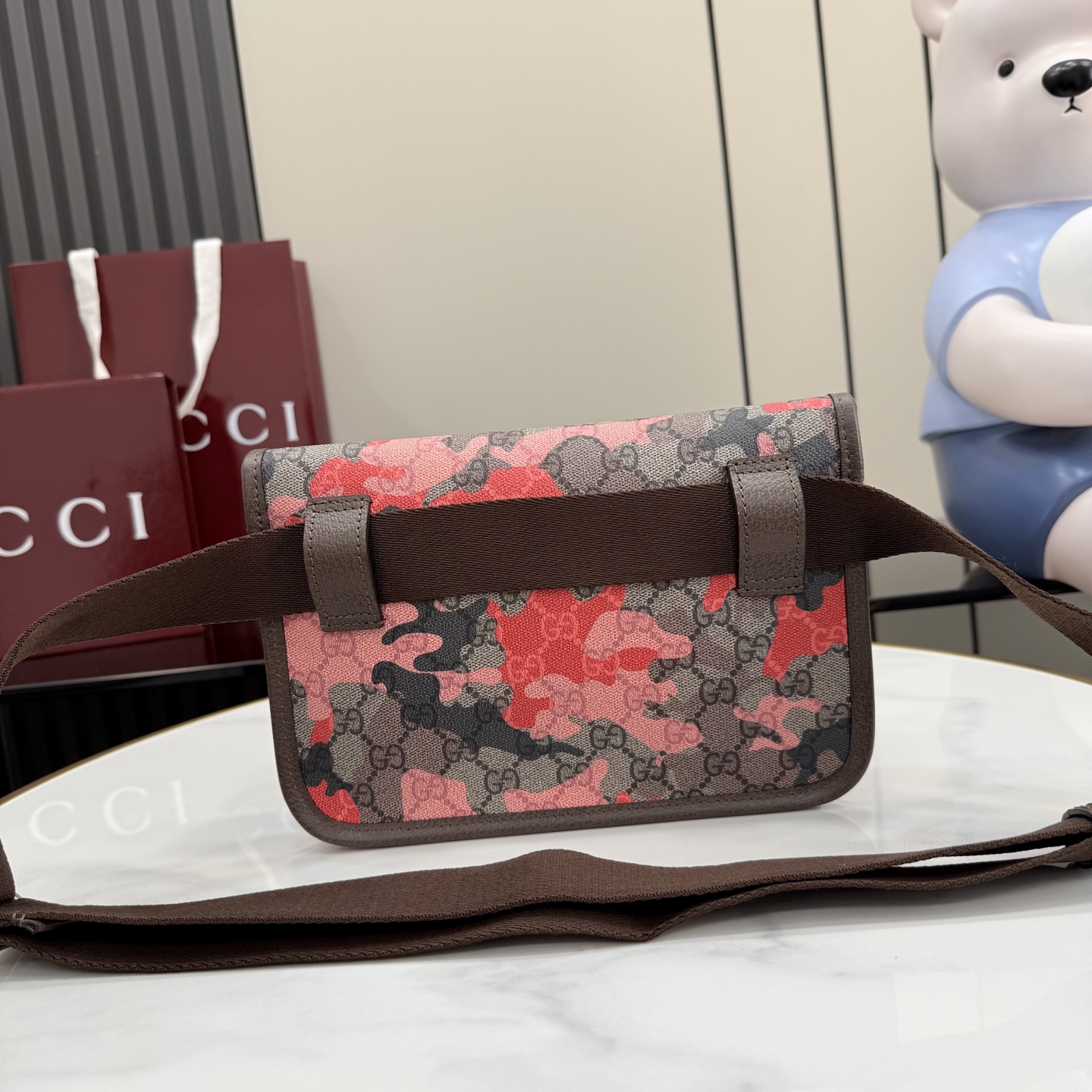 Поясная сумка Gucci с принтом GG
