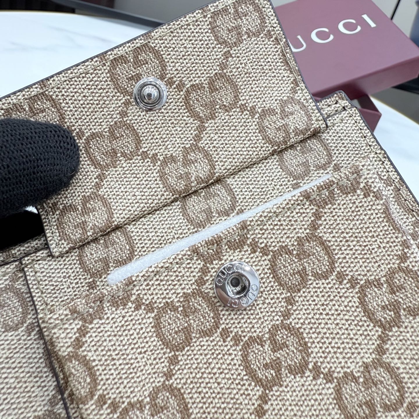 gucci dark brown leather bifold metal tag wallet