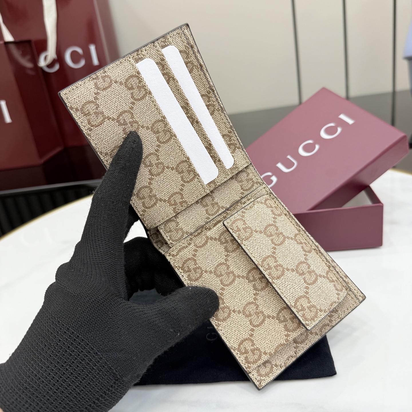 gucci dark brown leather bifold metal tag wallet